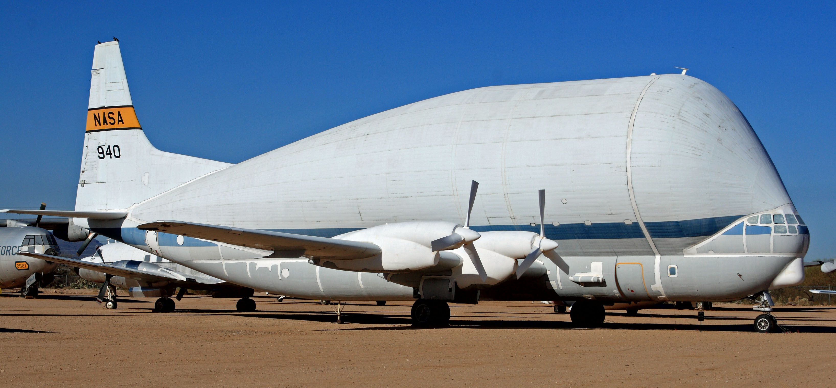 A NASA Super Guppy parked at an airfield.