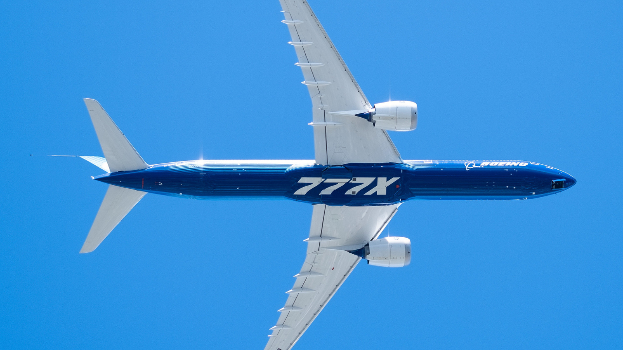 Boeing 777X flying overhead