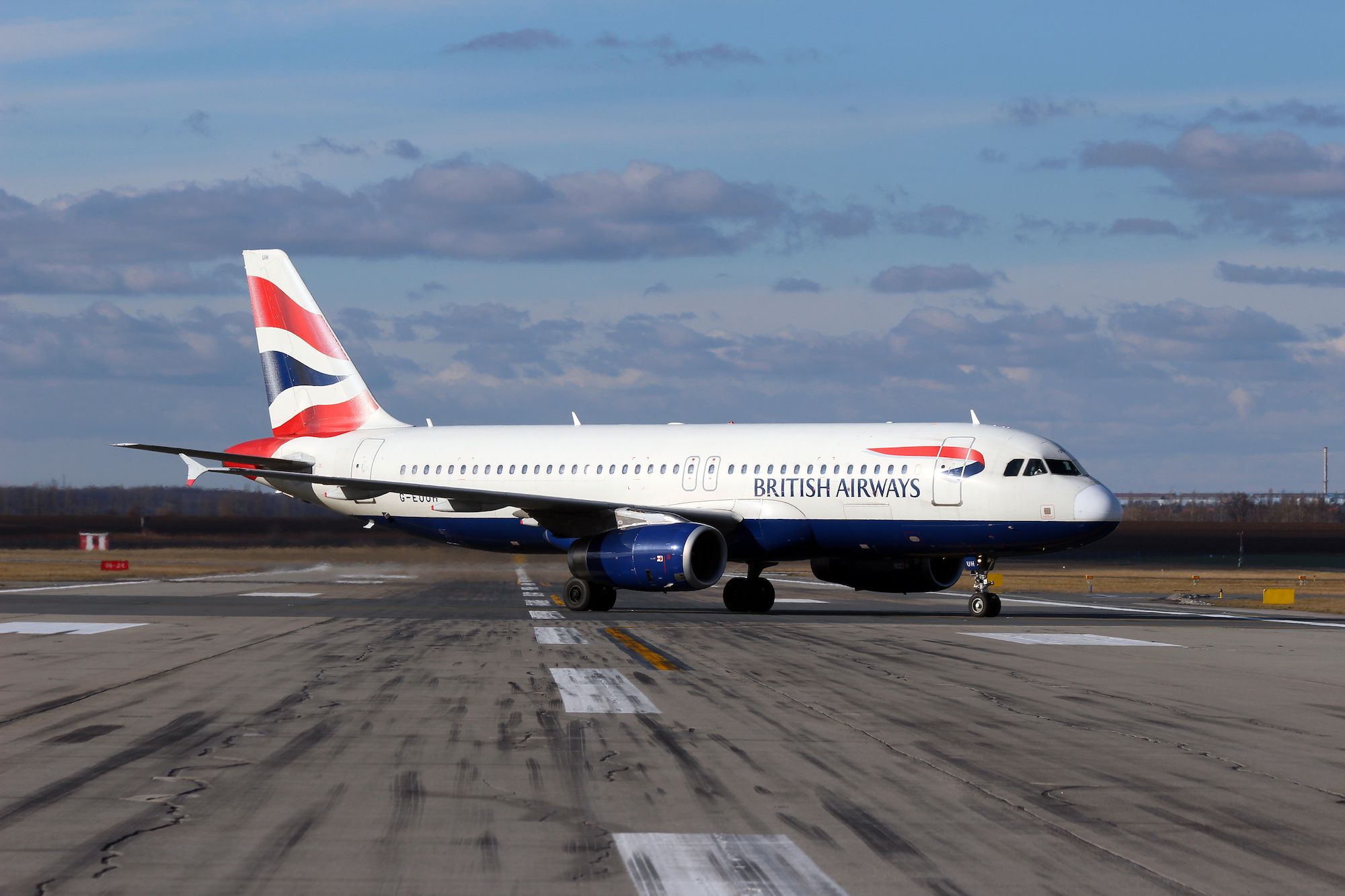 A British Airways Airbus A320 on the apron at Prague Airport.