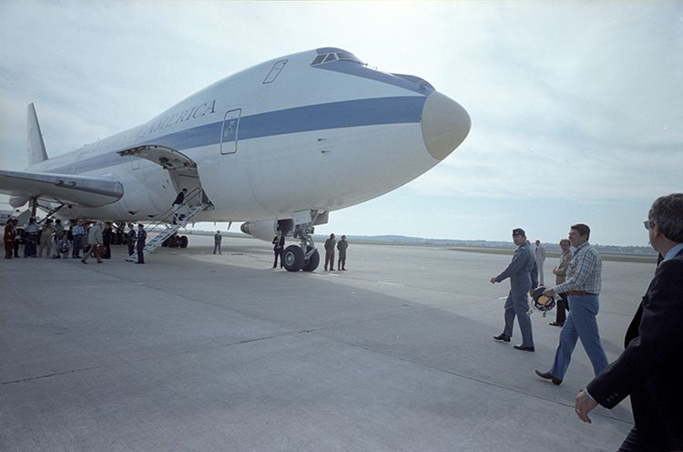 President Ronald Reagan boarding the E-4B Doomsday Plane.