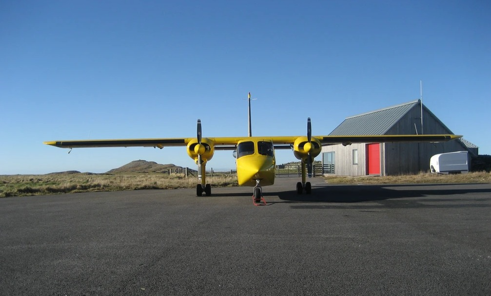 A Hebridean Air Services aircraft parked at an airport.