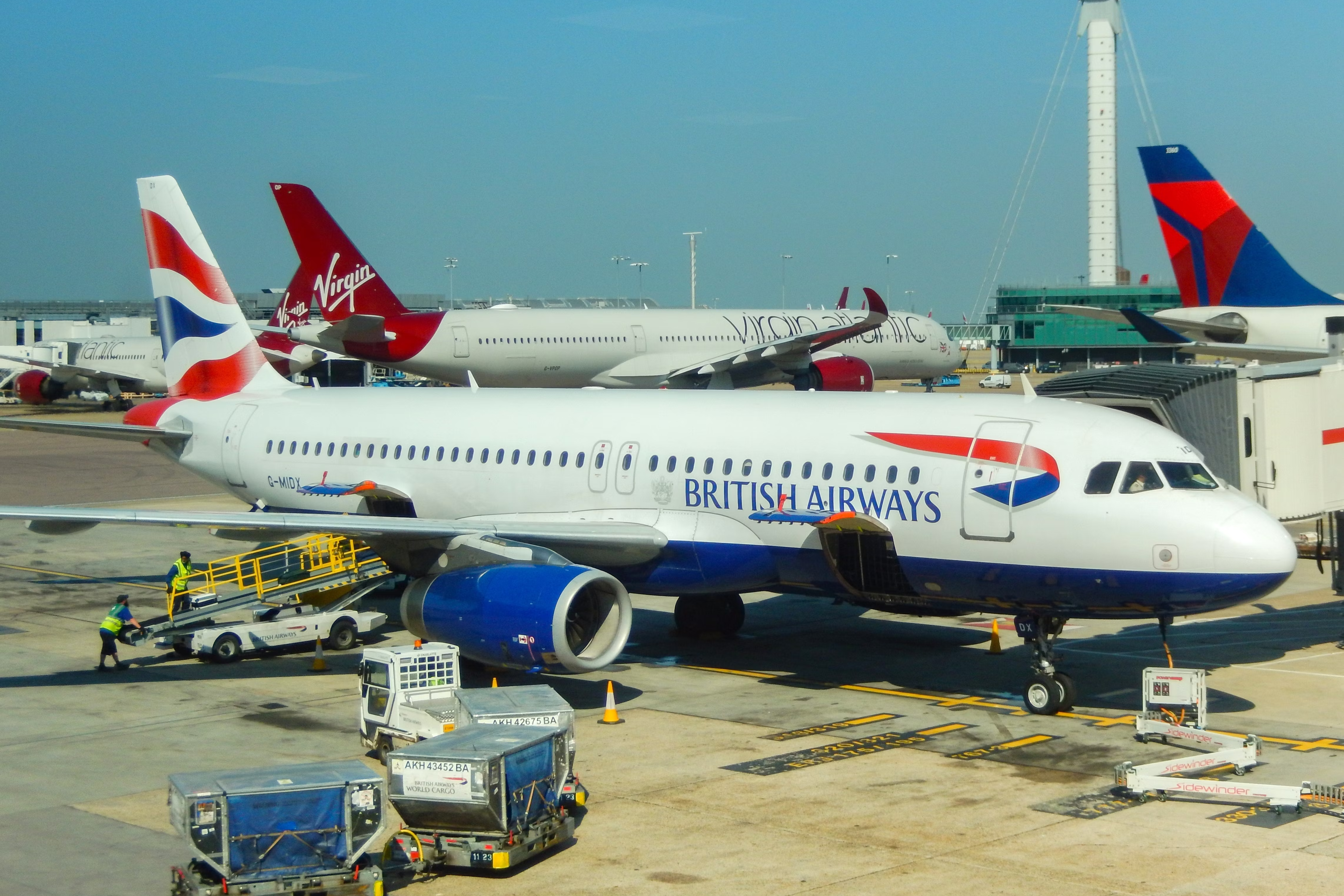 A British Airways Airbus A320 parked at the terminal in Heathrow Airport.