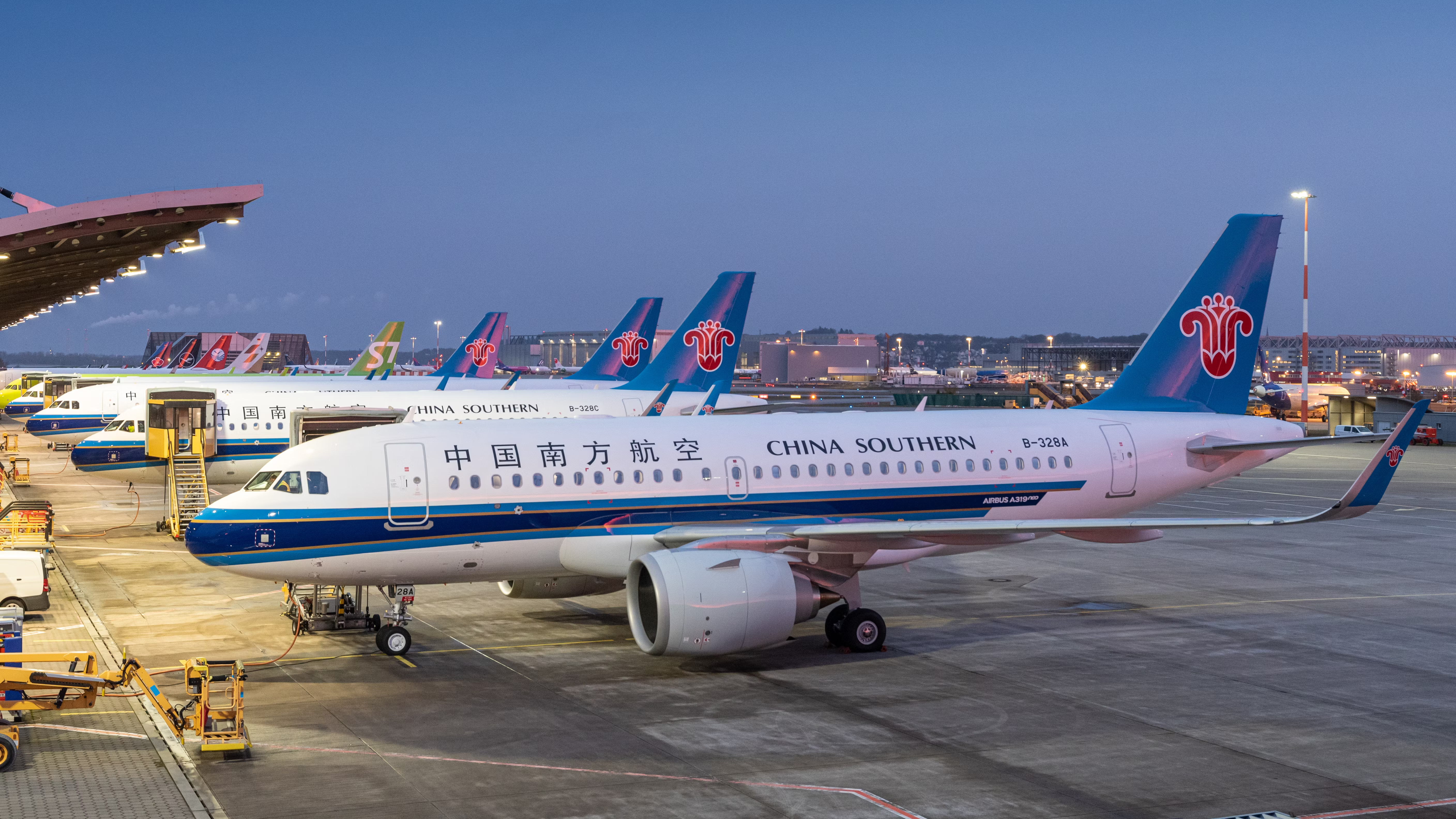 A China Southern Airlines Airbus A319neo Parked At Night.