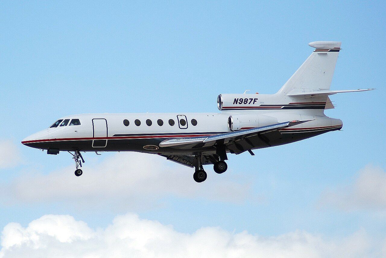A Dassault Falcon 50 flying in the sky.