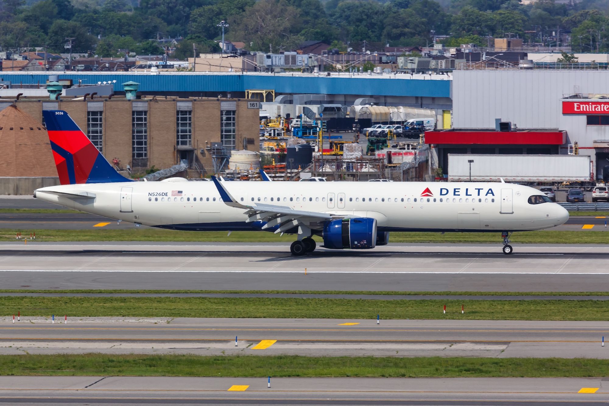 A Delta Air Lines Airbus A321neo on a taxiway.