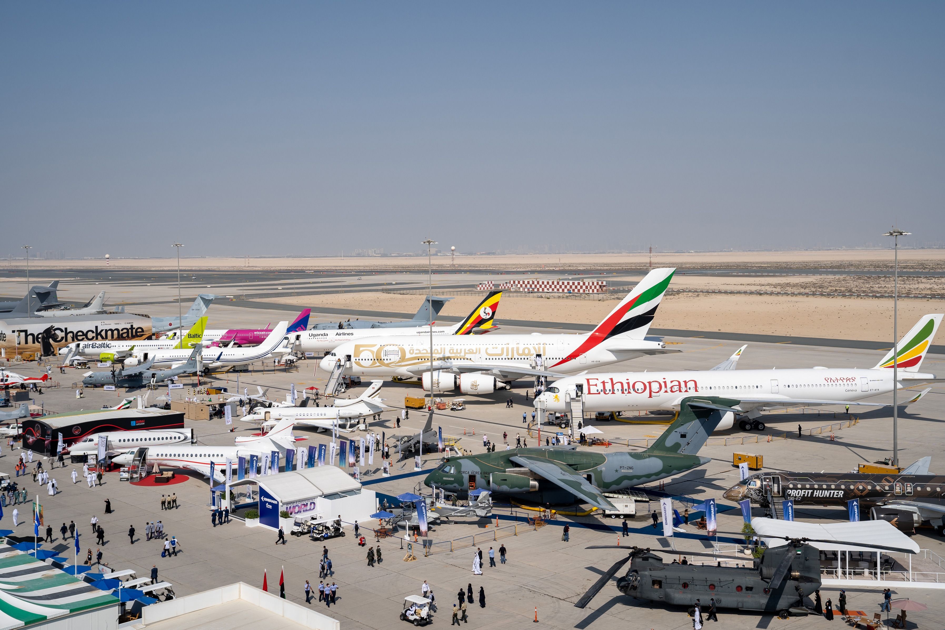 Aircraft from several commercial, private, and military operators parked at the Dubai Airshow 2021.