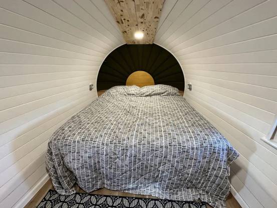 a bed in a tunnel