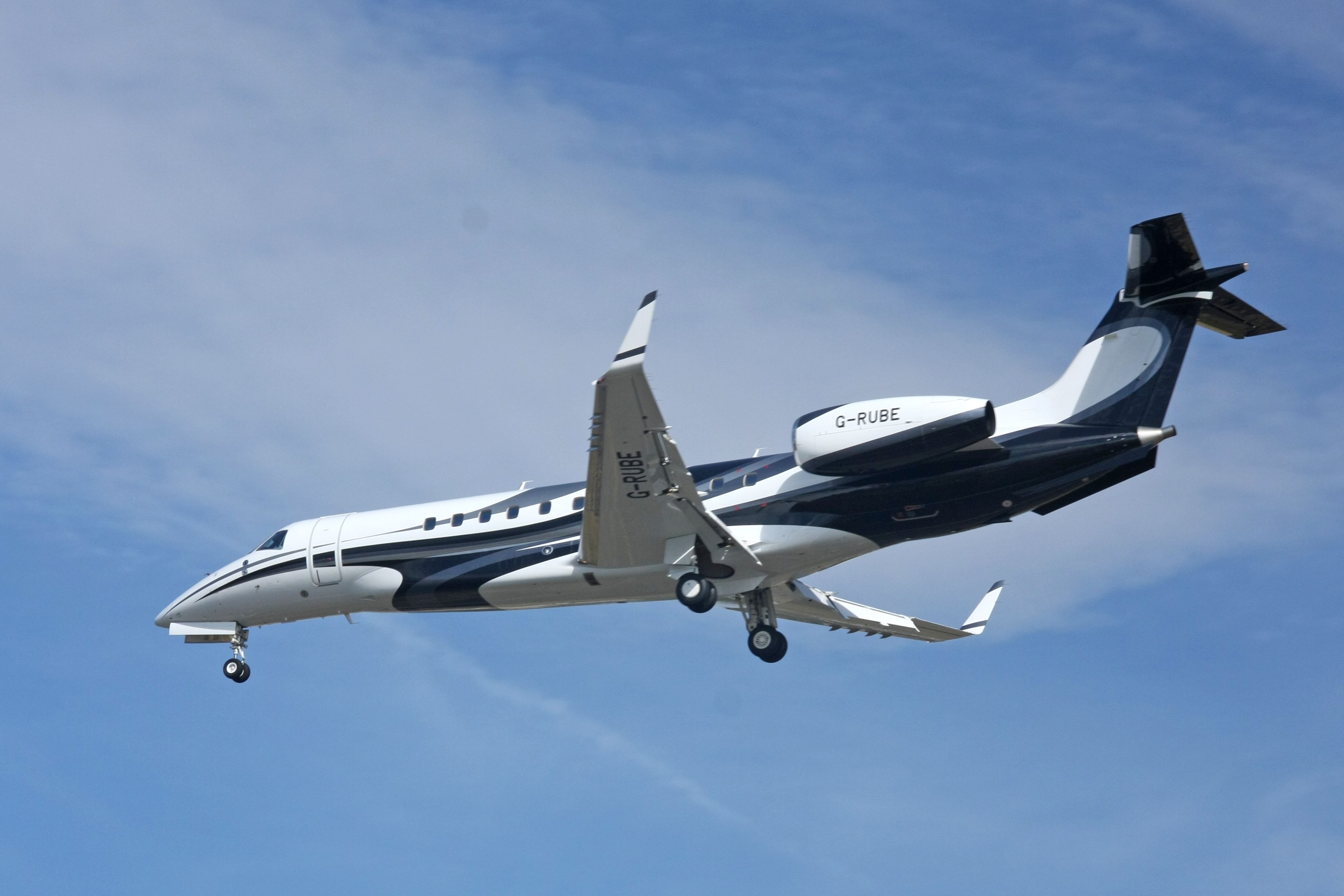 An Embraer Legacy 600 flying in the sky.