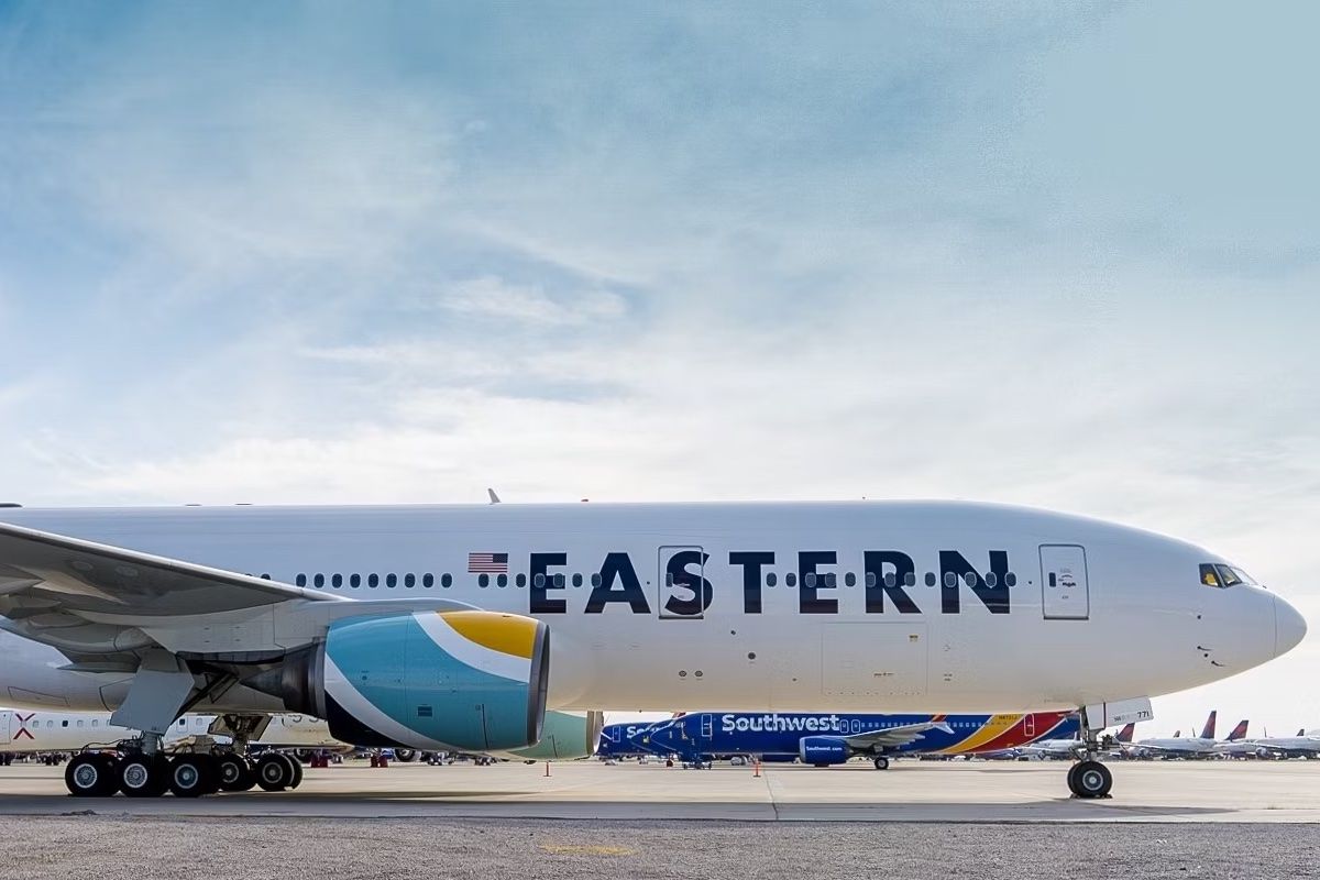 An Eastern Airlines Boeing 777 parked at an airport.