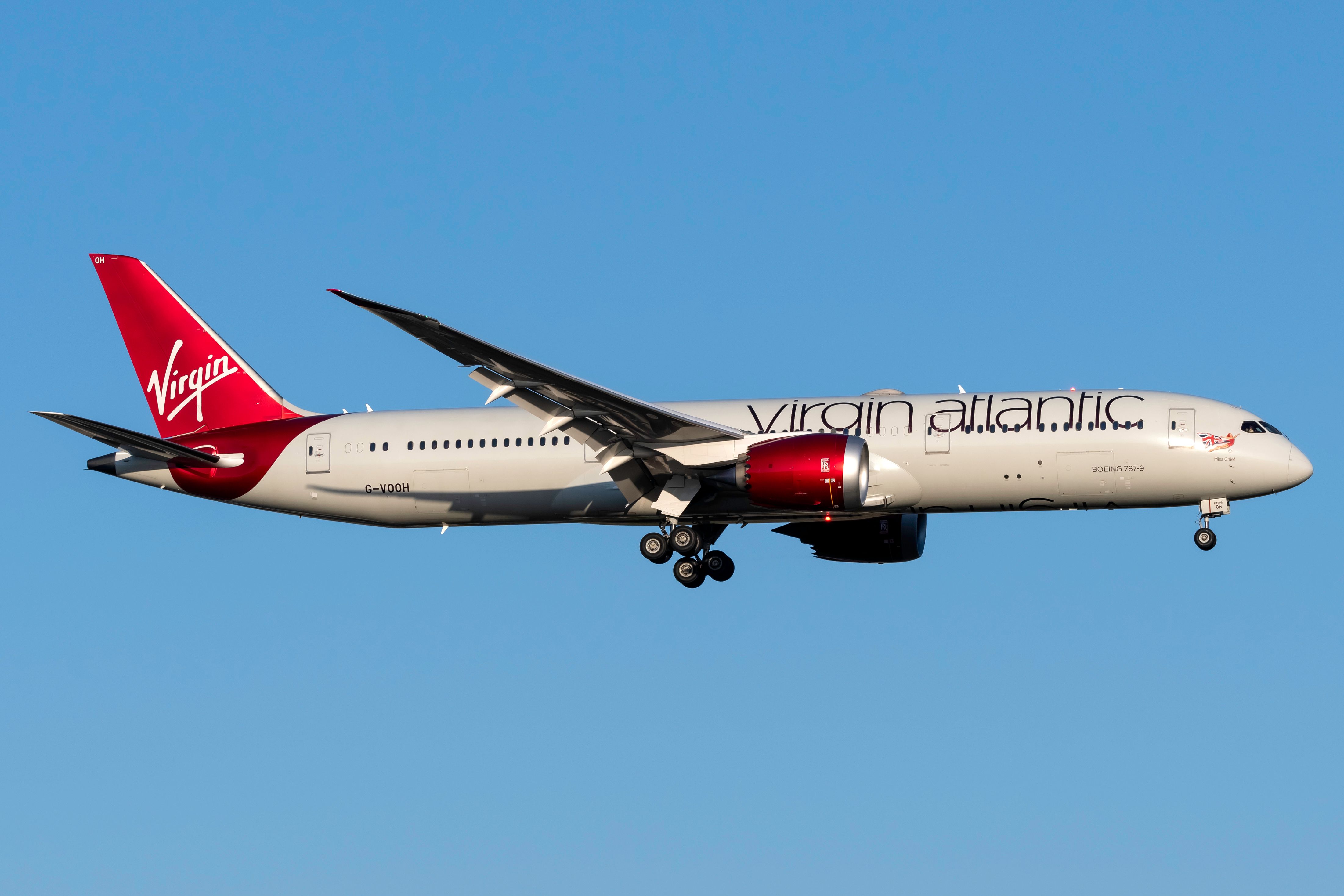 A Virgin Atlantic Boeing 787-9 Dreamliner flying in the sky.