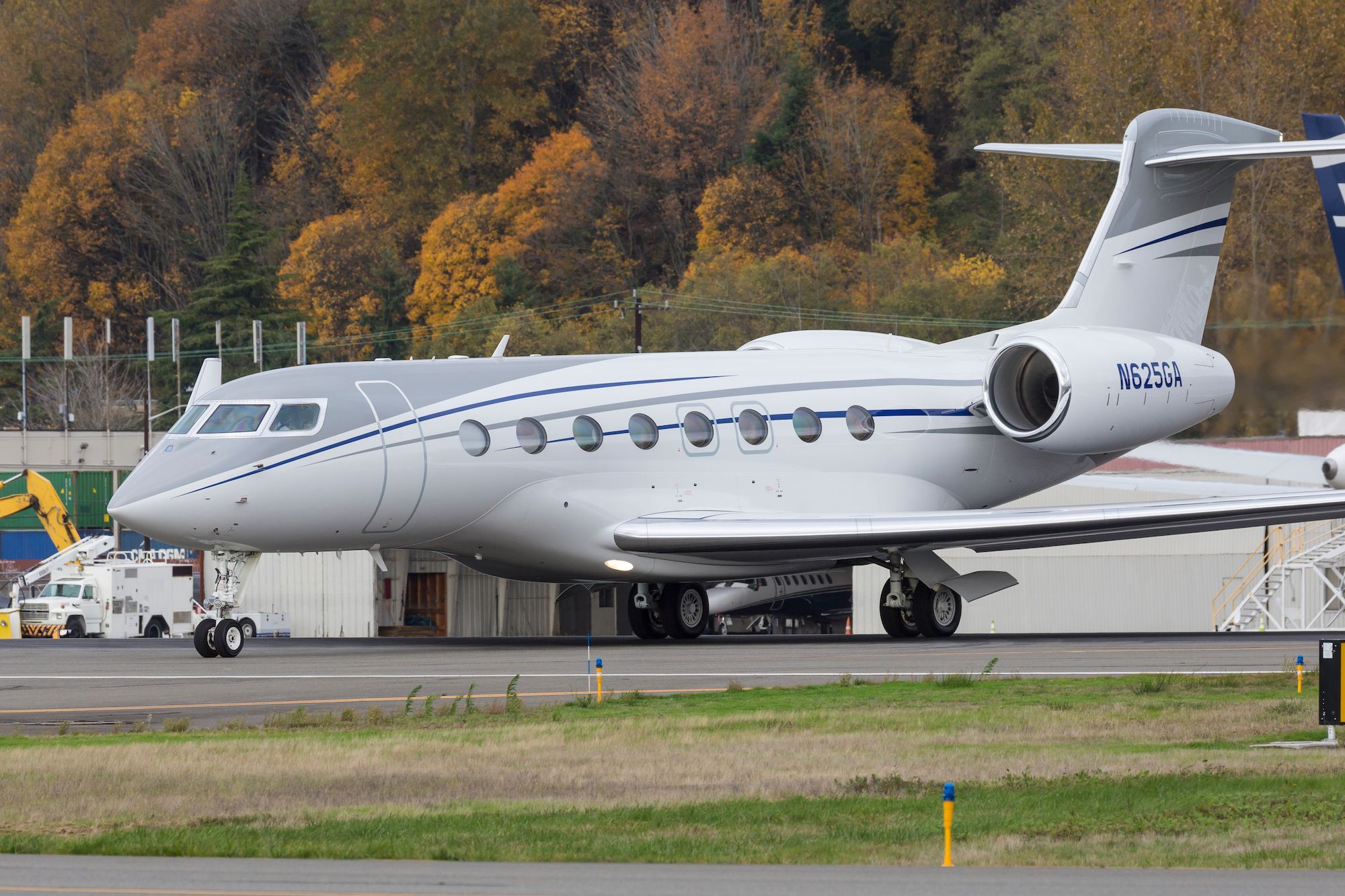 A Gulfstream G650 on a taxiway.