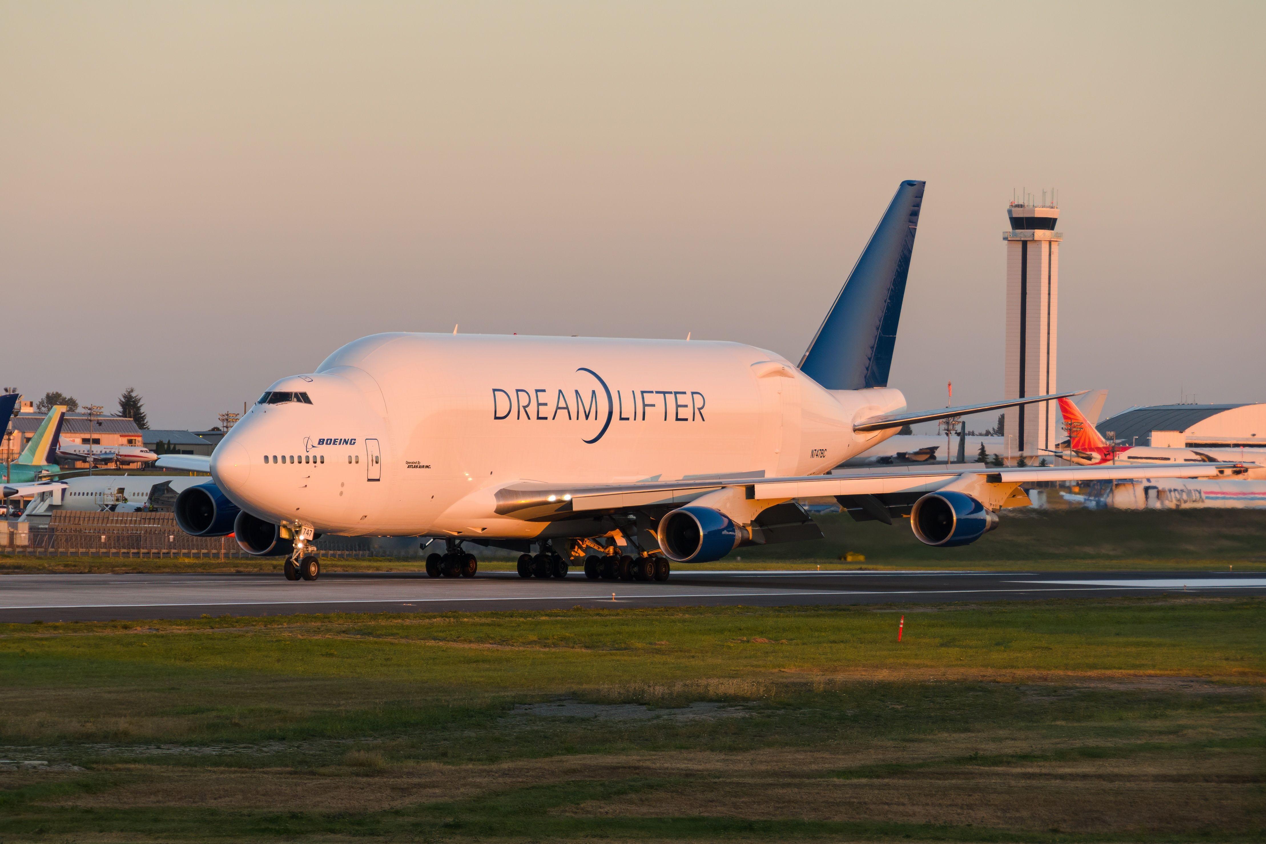 A Boeing Dreamlifter aircraft taxiing to the runway.