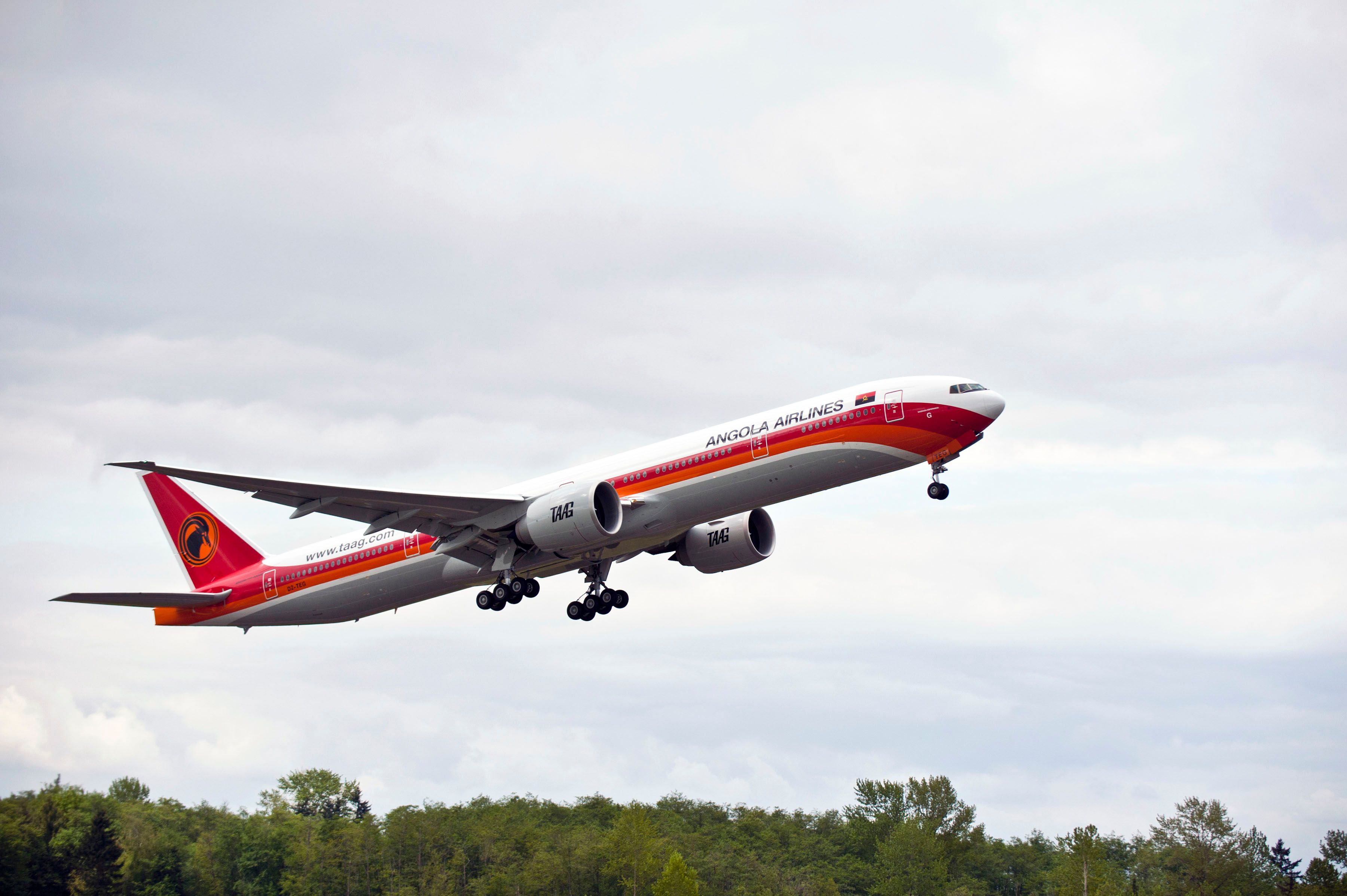A Taag Angola Airlines Boeing 777 Taking Off.