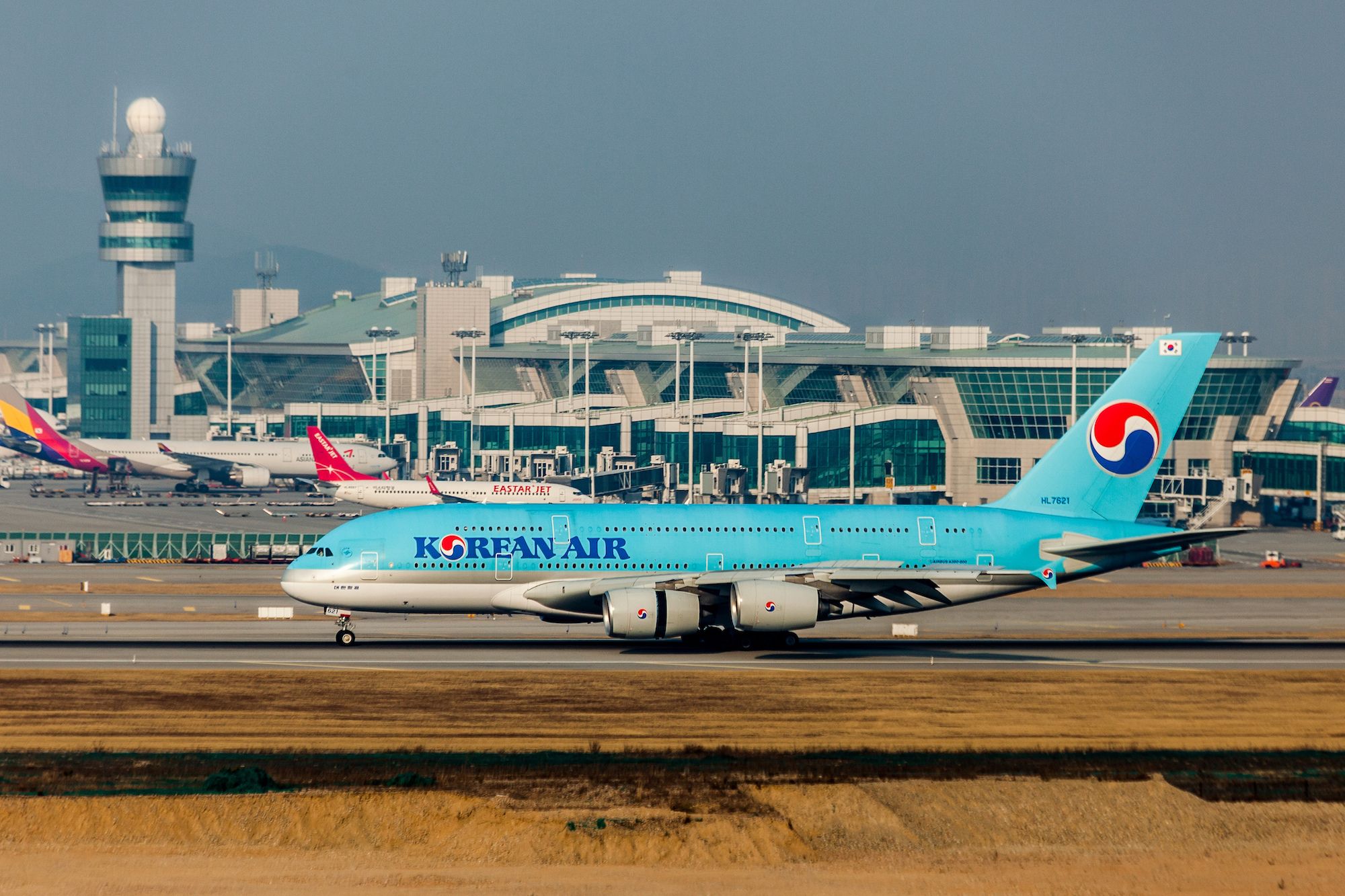 A Korean Air Airbus A380 with its thrust reversers deployed at Seoul Incheon International Airport.