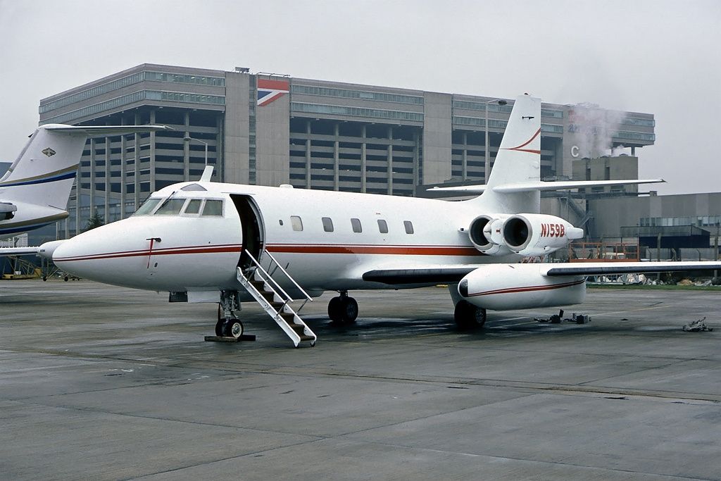 A Lockheed JetStar parked at an airport.