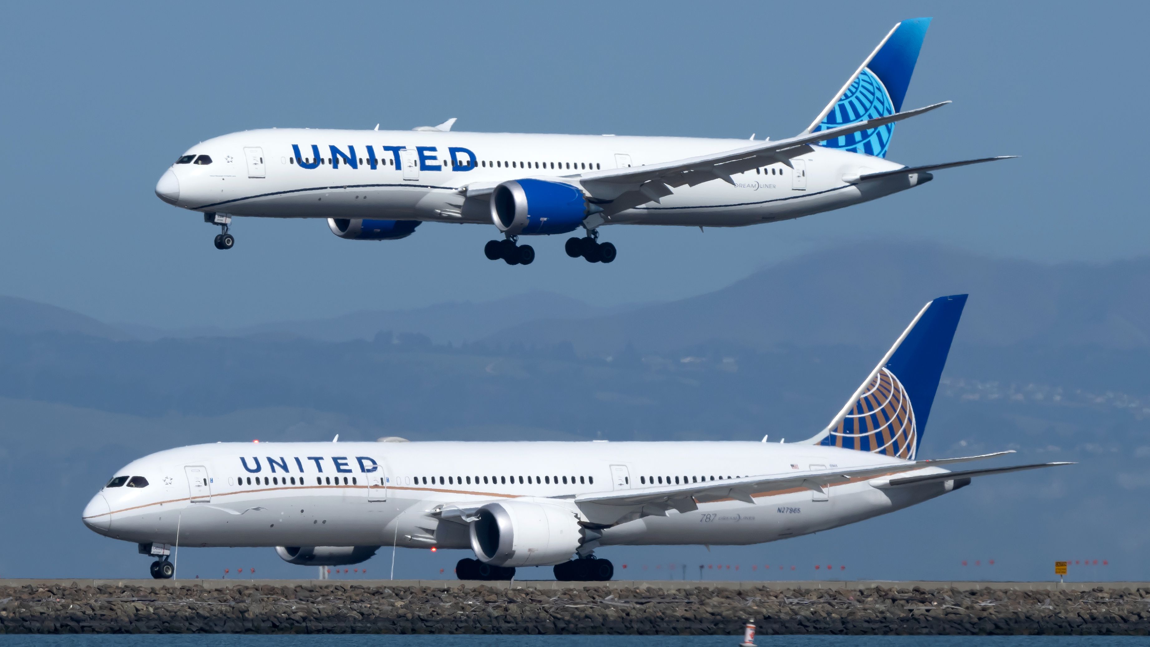 Two United Airlines Boeing 787 Dreamliners, one on a taxiway and the other in the air about to land.