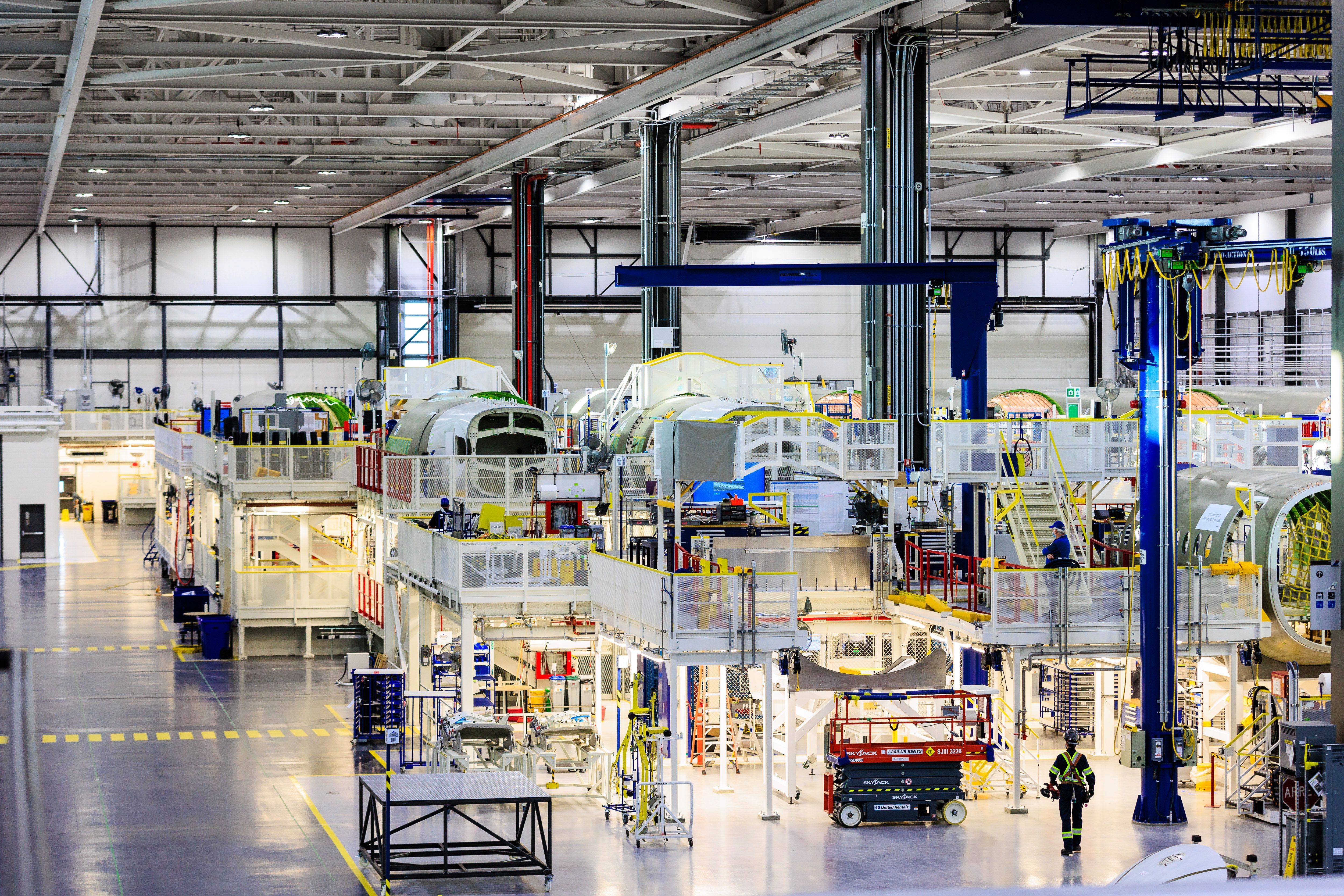Many aircraft parts in the Airbus' A220 assembly line.