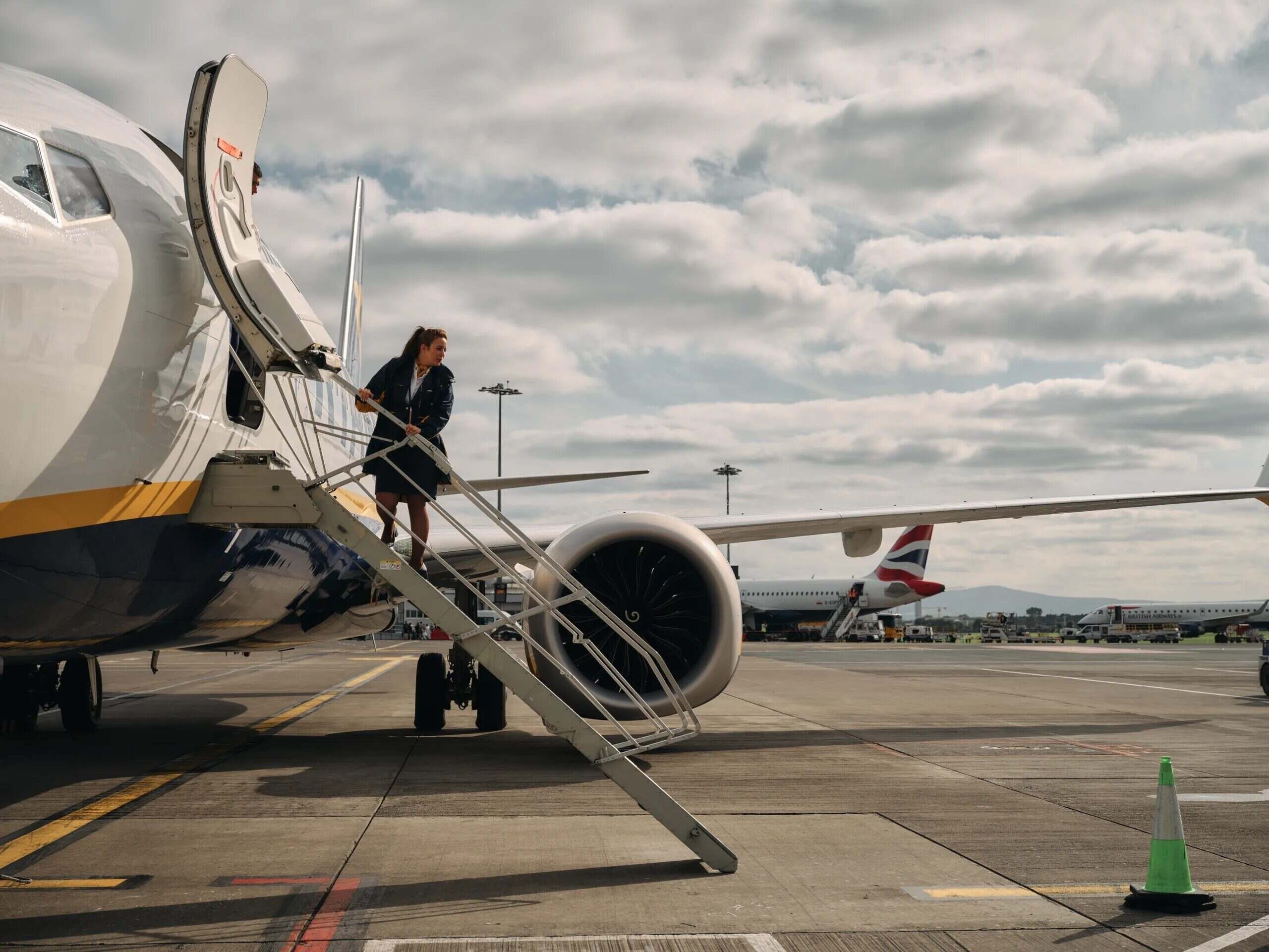 RAexterior-8671-compressed-for-w - Ryanair Flight Attendant on Boeing 737 steps