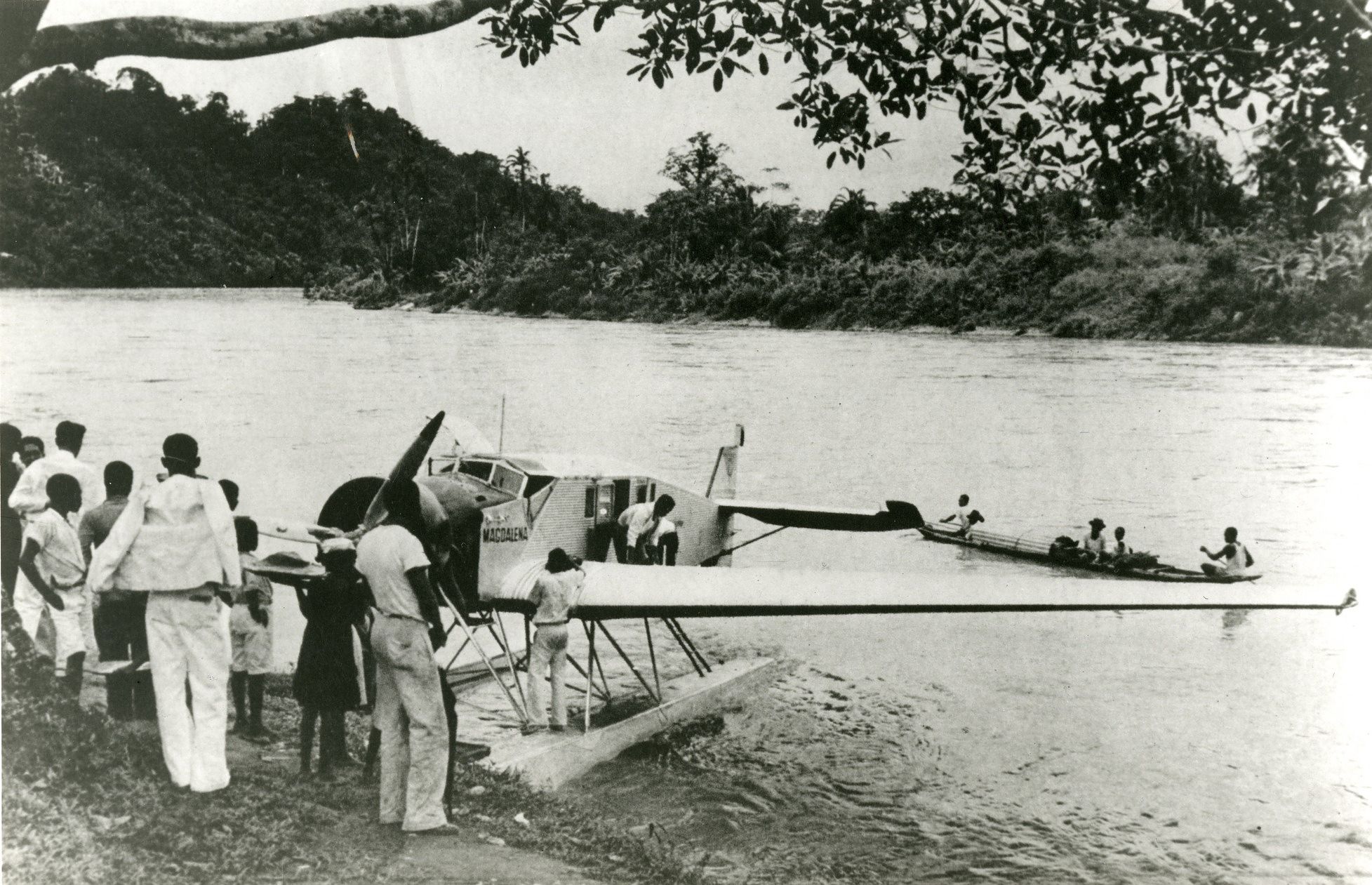 A SCADTA Junkers plane parked on water.