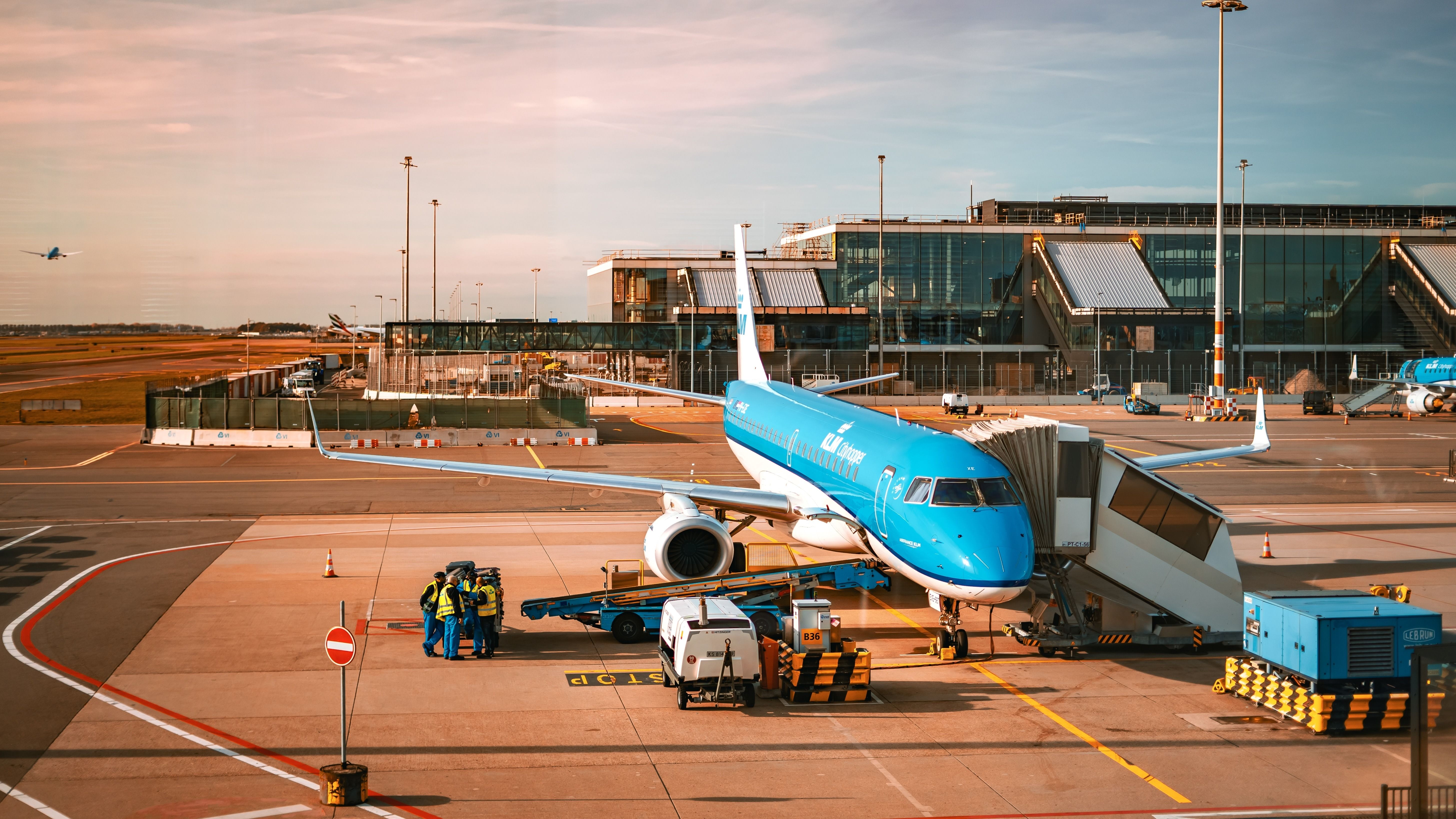 A KLM aircraft parked at an air stand.