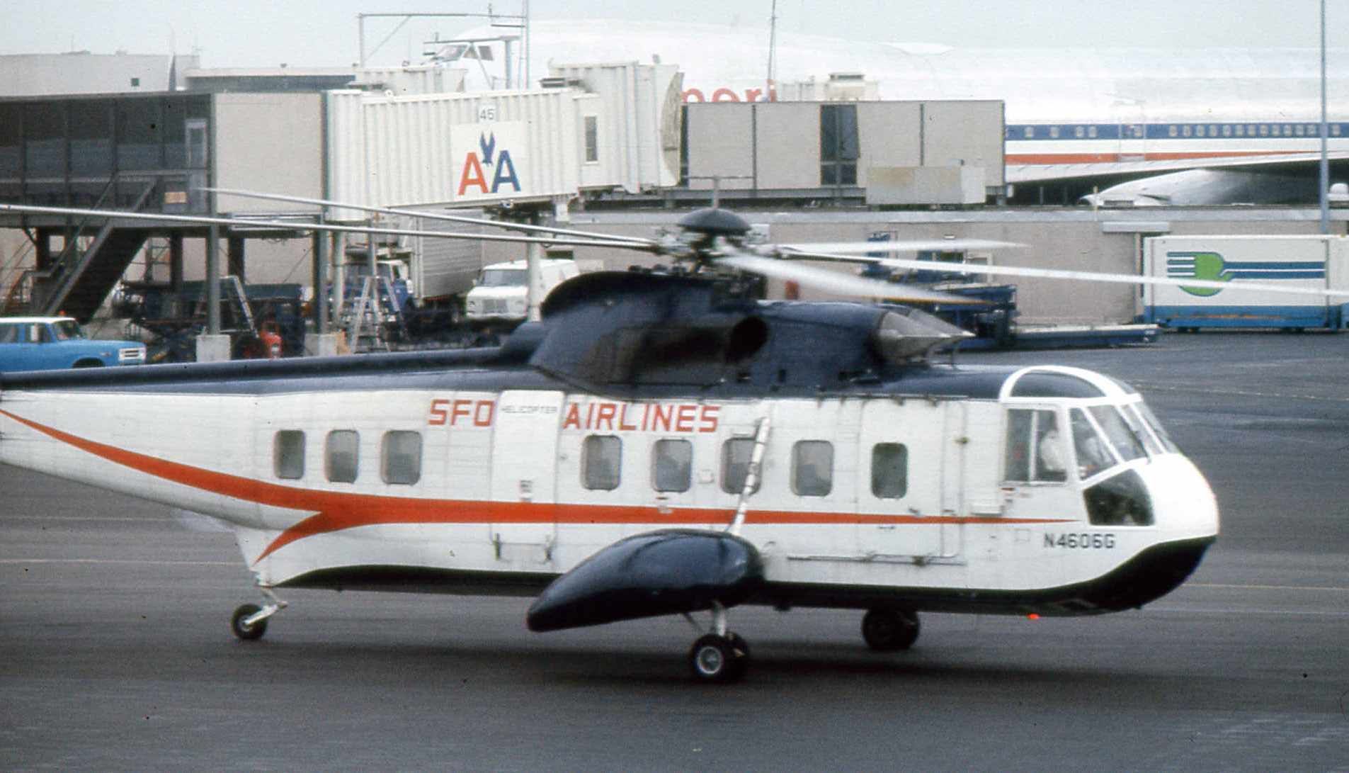 Vintage photo of a white helicopter with SFO Airlines in red lettering on the side