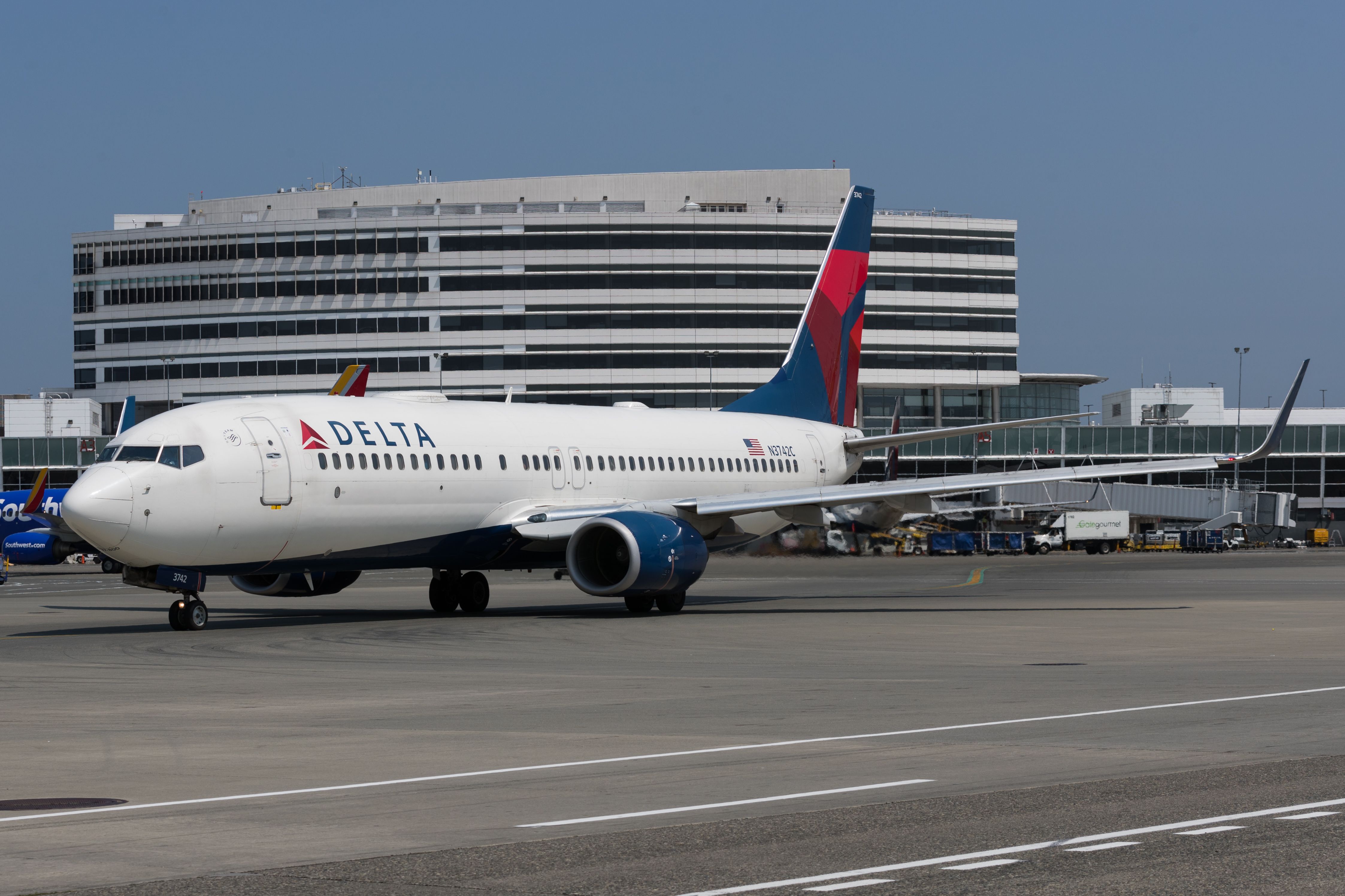 A Delta Air Lines Boeing 737-900ER Taxiing In Seattle.