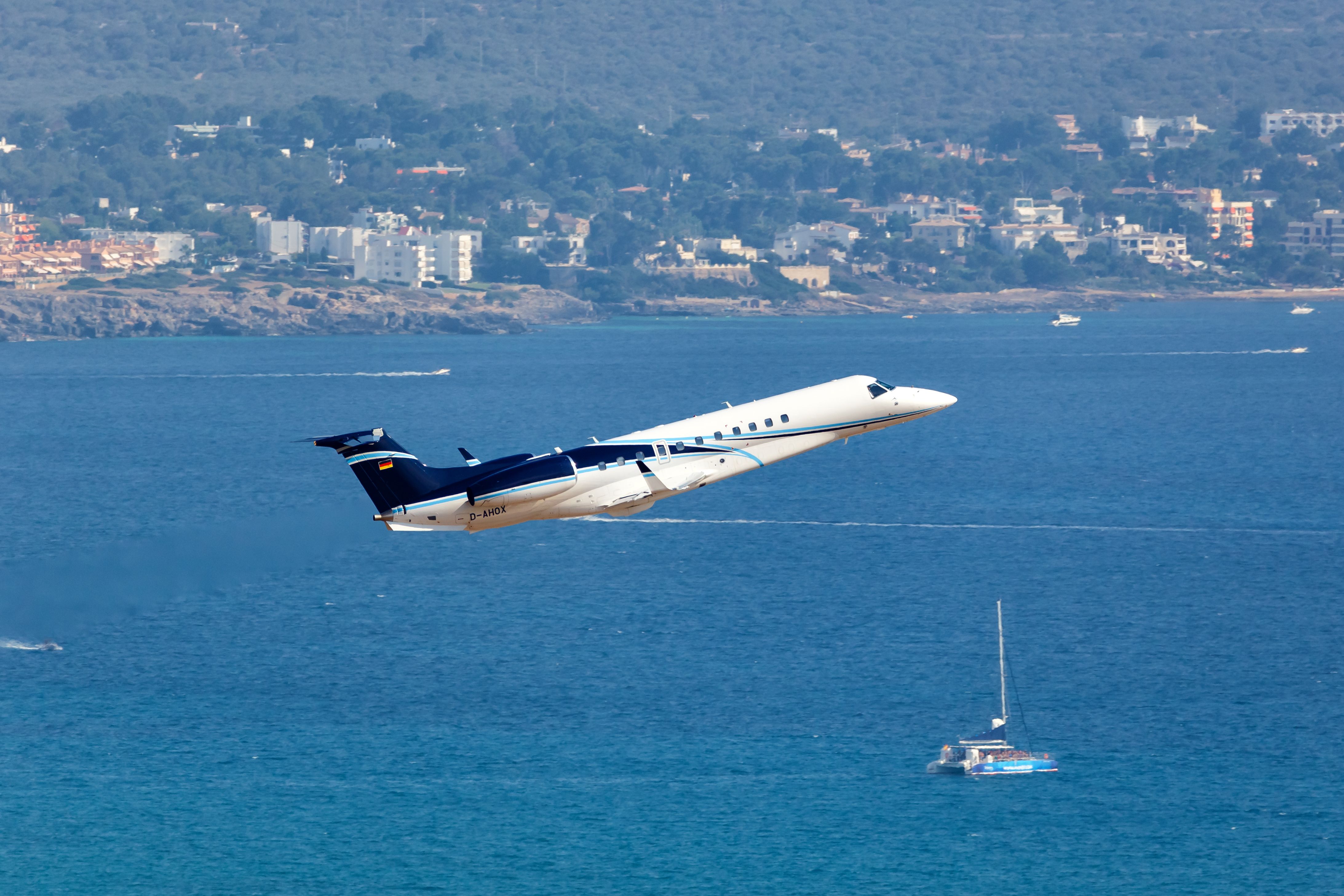 An Embraer Legacy 650 private jet taking off