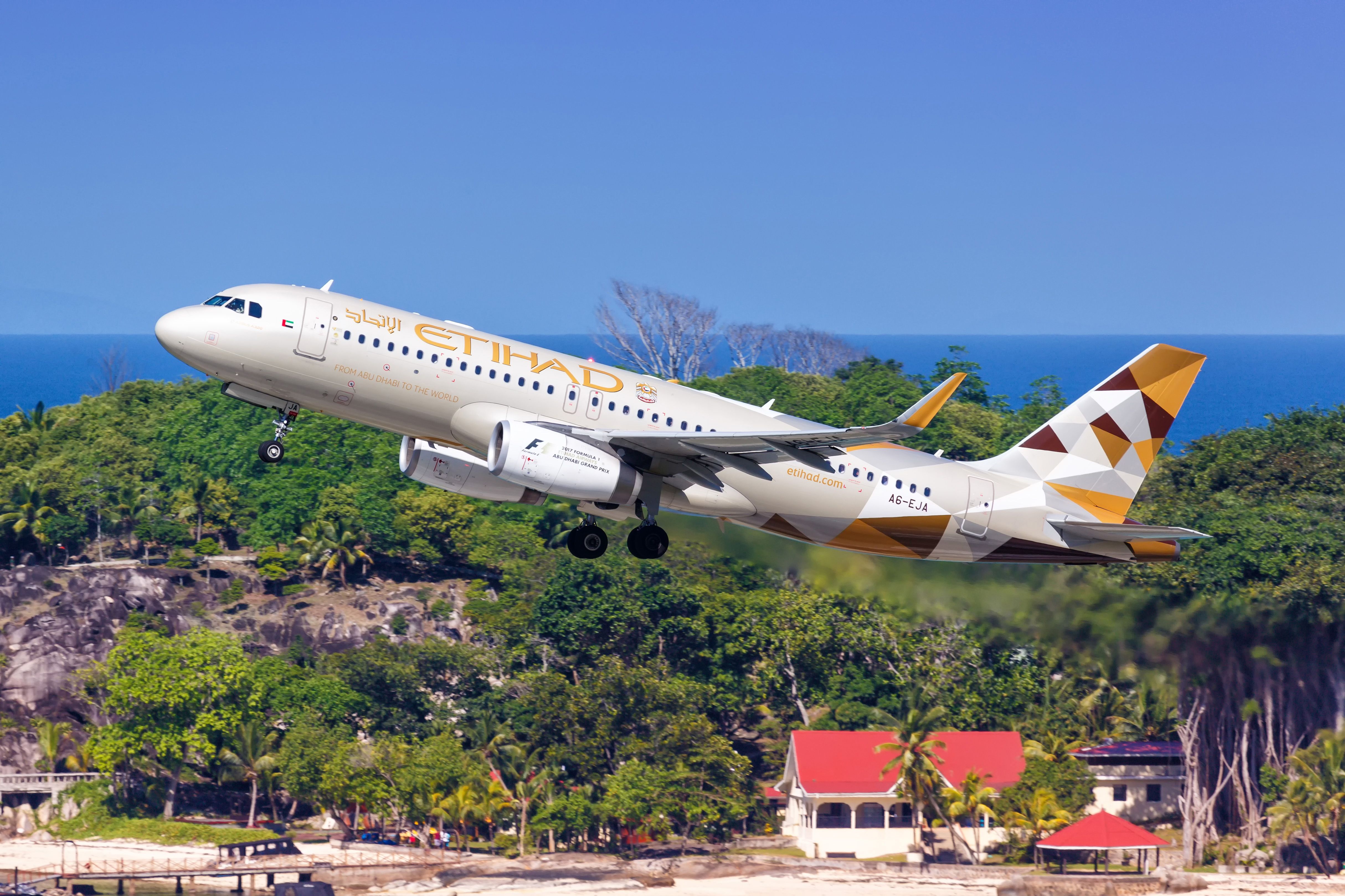 An Etihad Airbus A320 taking off from Mahe.