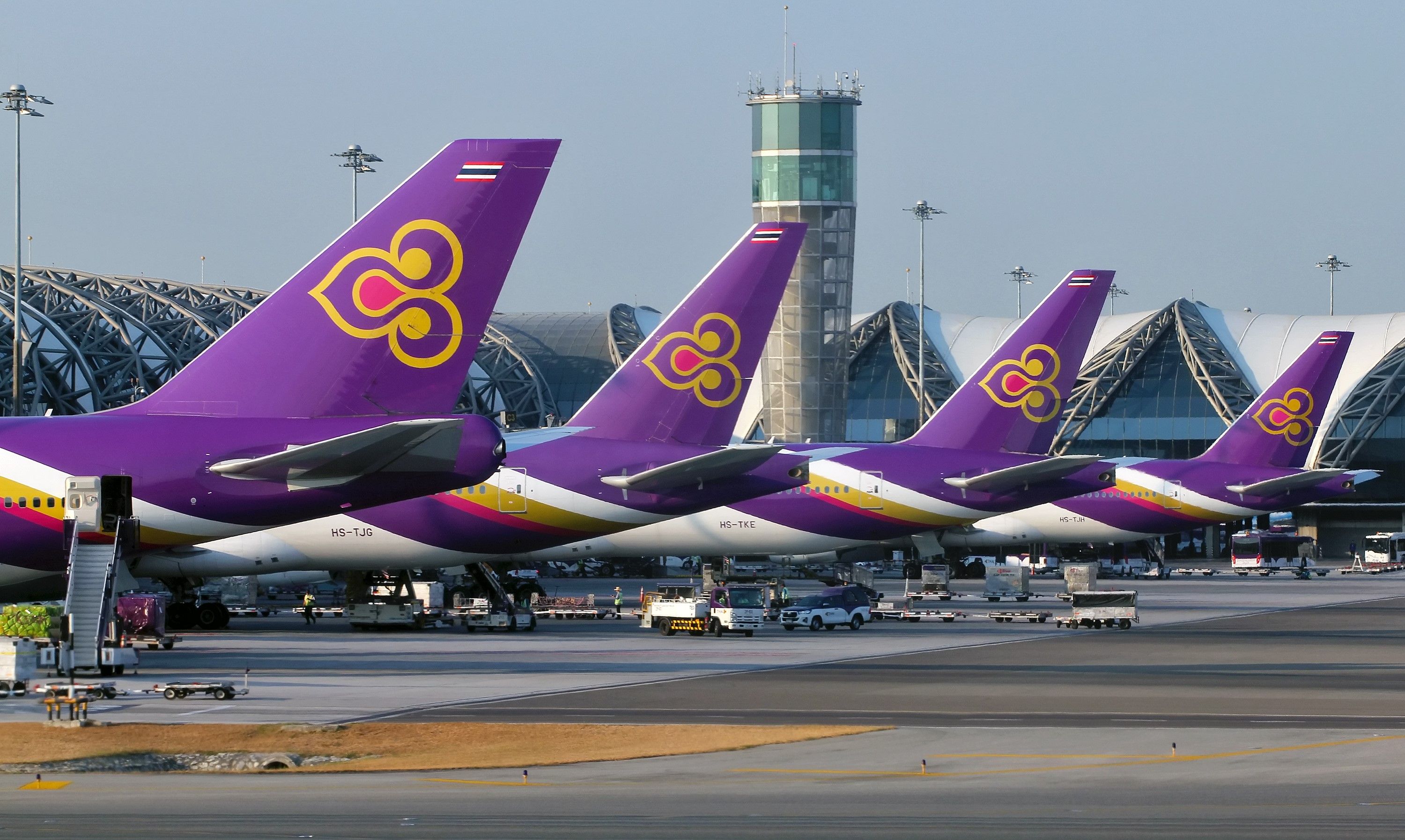Thai Airways planes lined up.