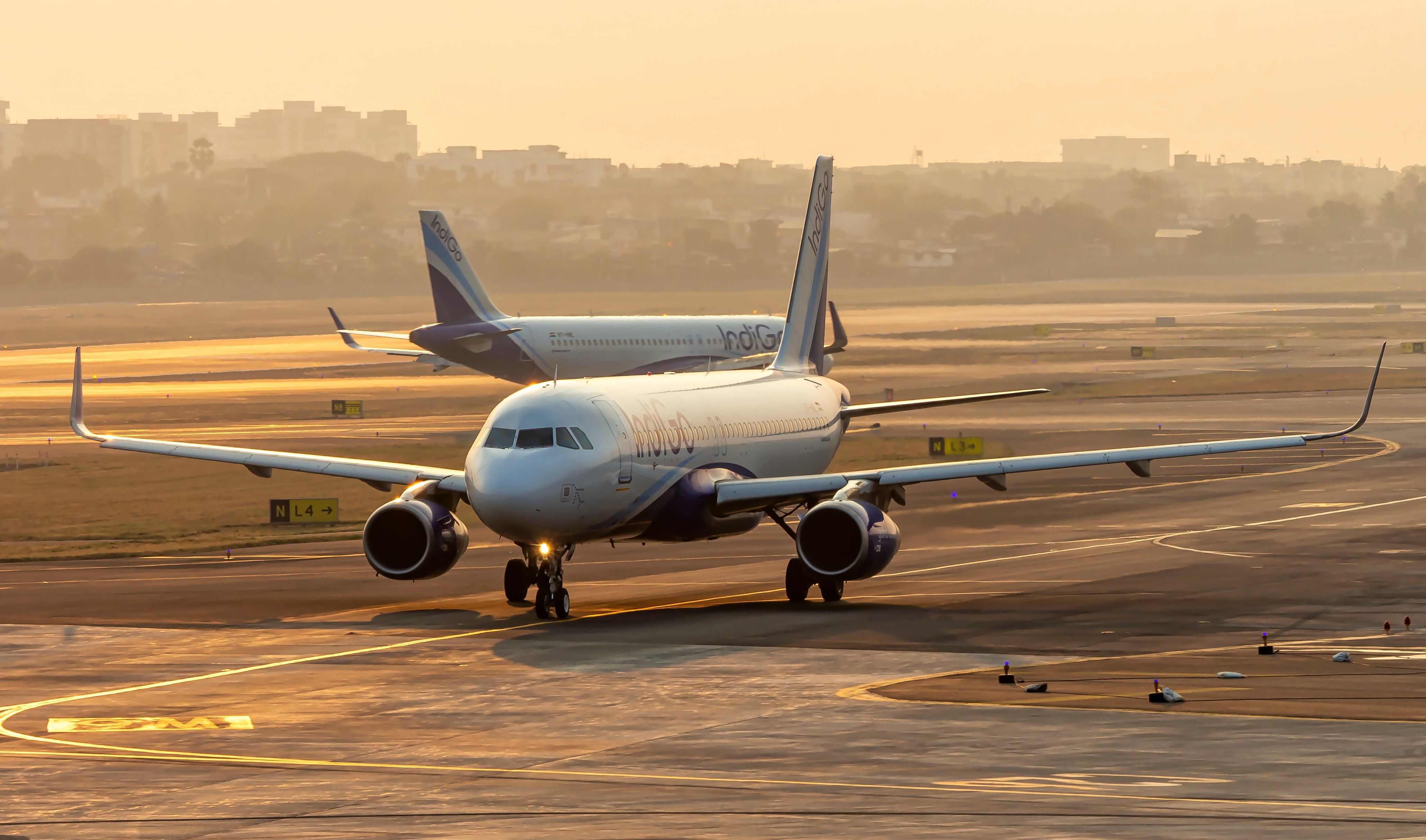 An IndiGo Airbus A320 aircraft taxiing to the runway.