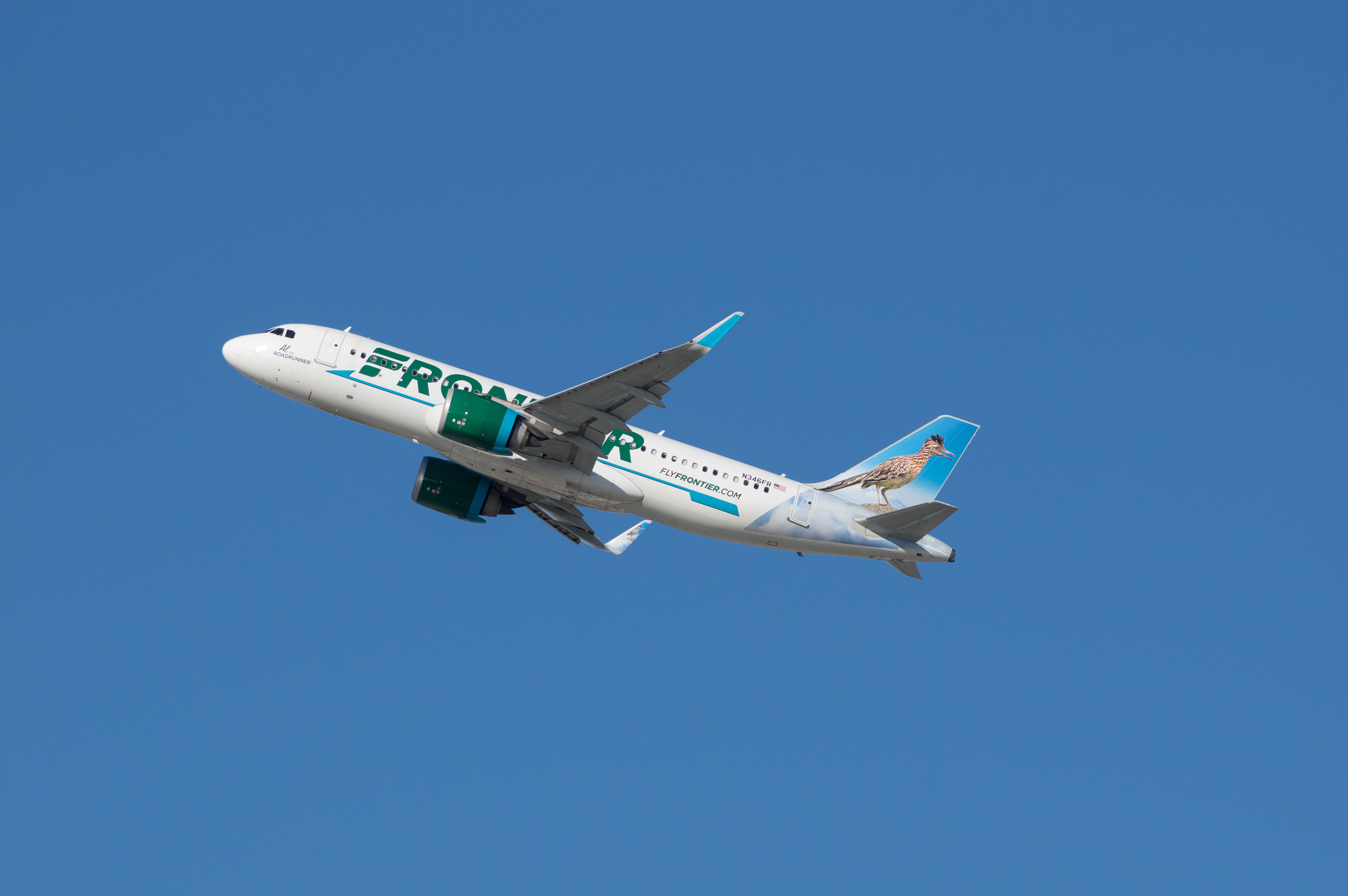 shutterstock_1893279976 - Los Angeles International Airport, California, USA - December 31, 2020: this image shows Frontier Airlines 'Al the Roadrunner' Airbus A320 airborne. Aircraft registration, N346FR.