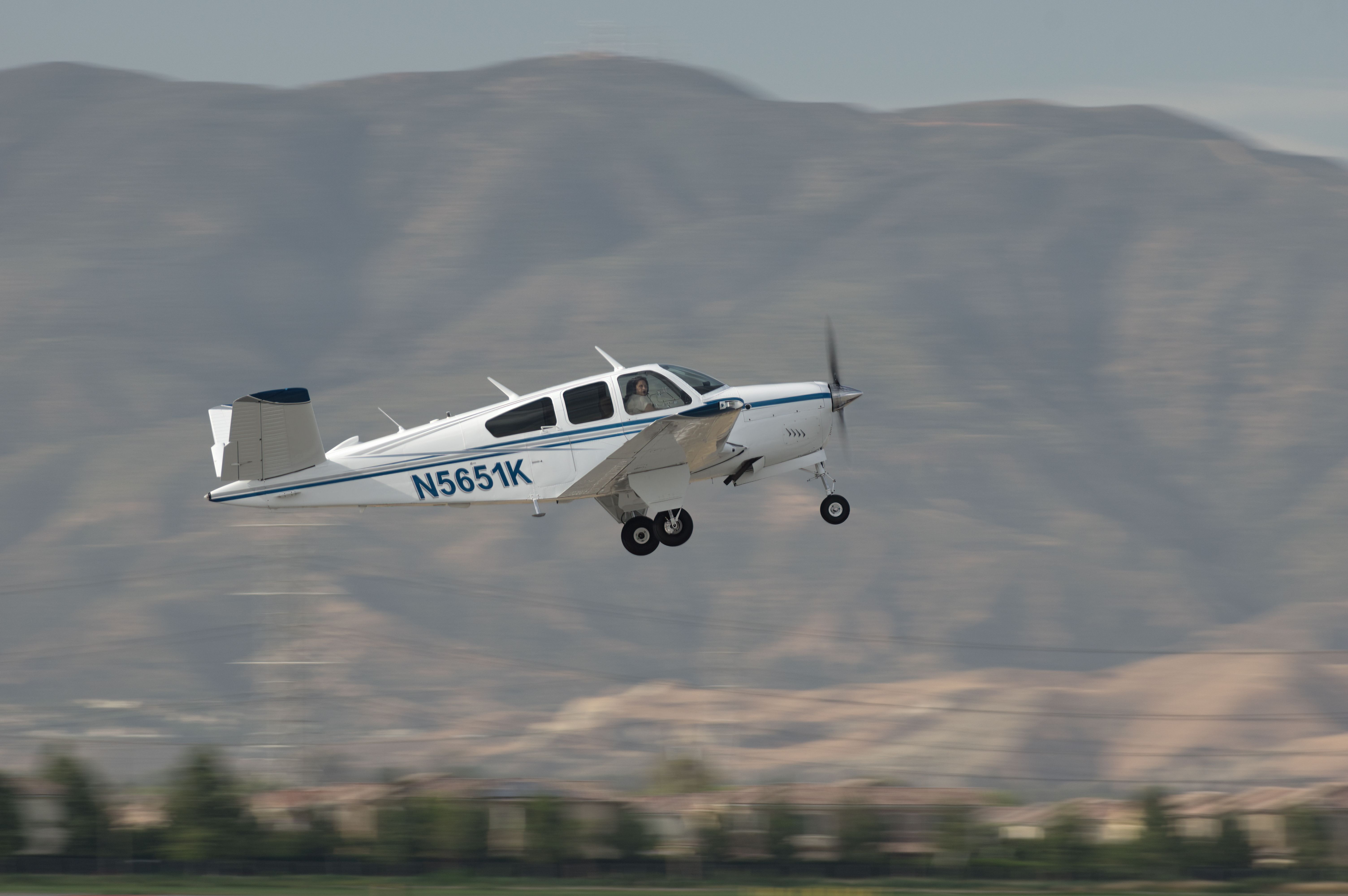 A V-tailed Beechcraft Bonanza taking off
