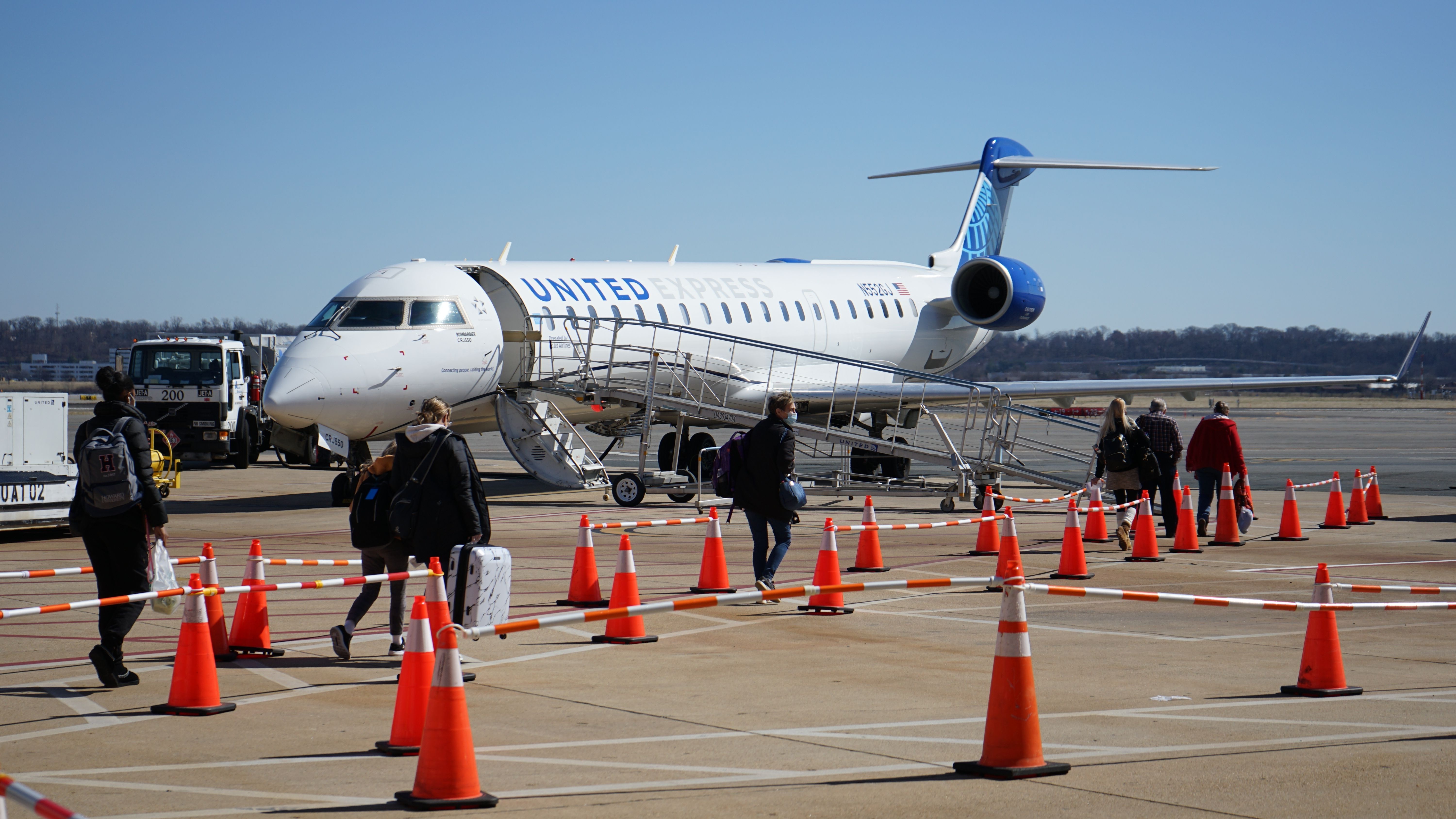 Arlington, Virginia, USA - March 2022: a Bombardier CRJ550 in service for United Express at Ronald Reagan Washington National Airport.