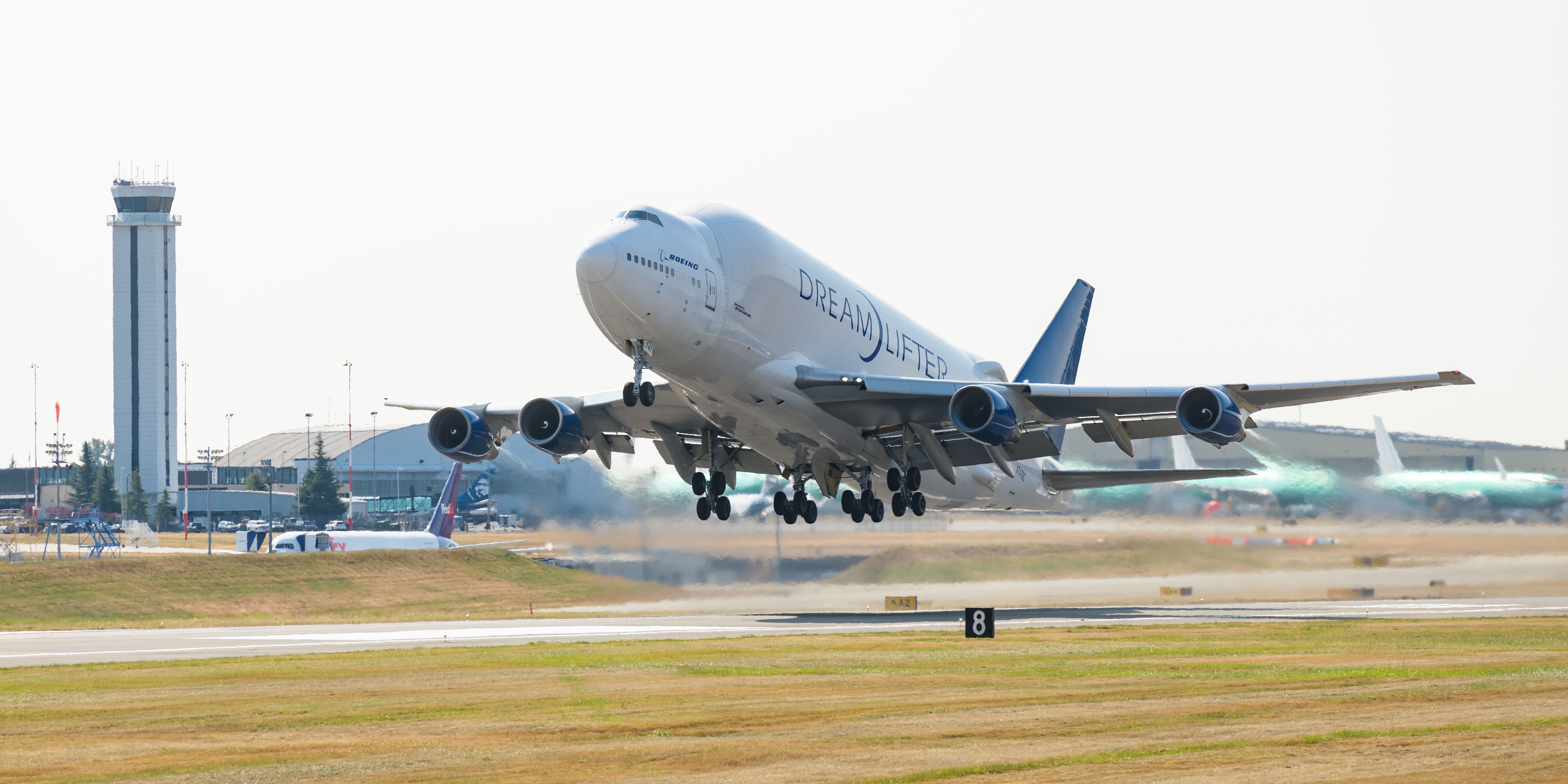 A Boeing Dreamlifter just after taking off.