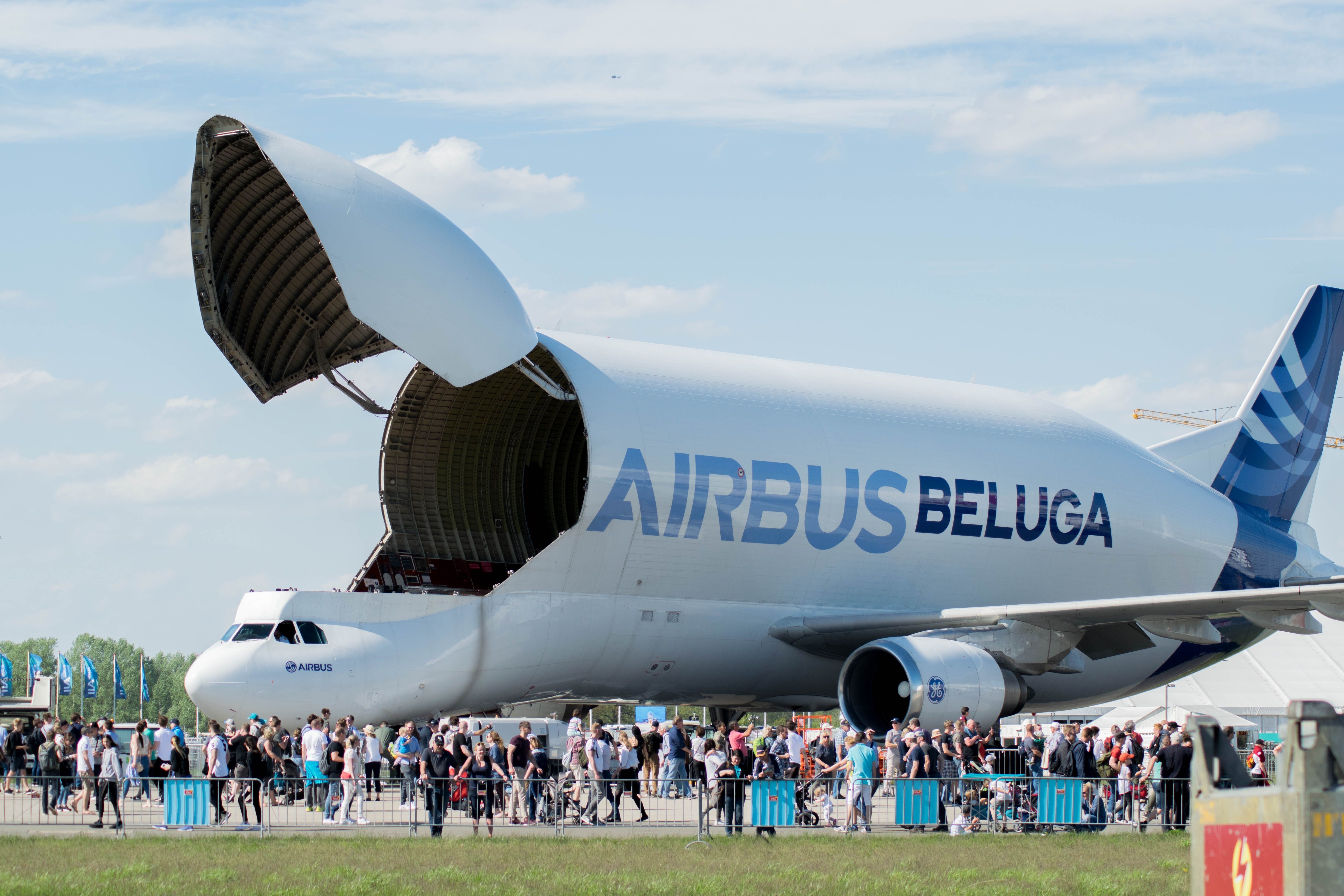An Airbus BelugaXL with its cargo door open.
