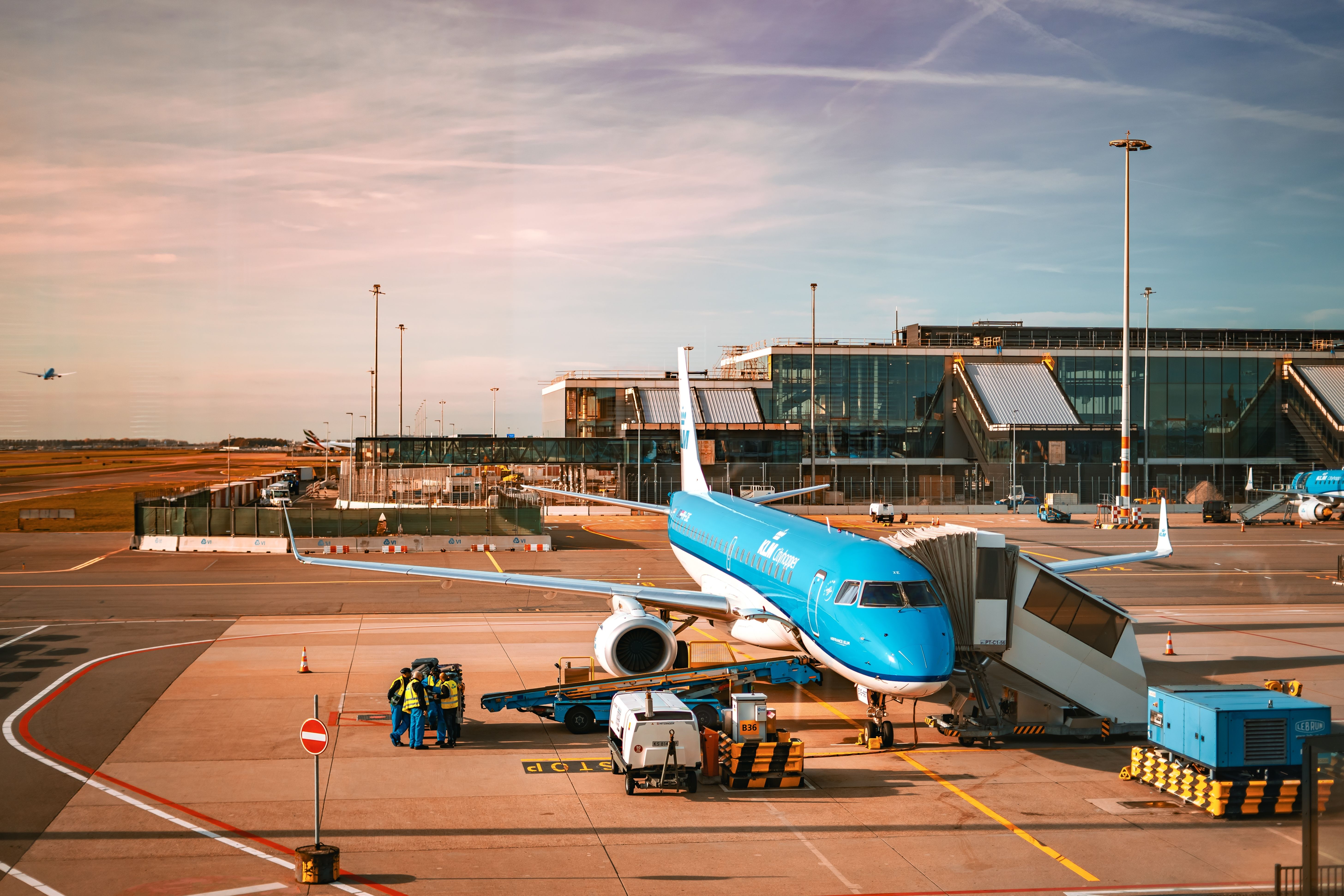 A KLM aircraft parked at an air stand.