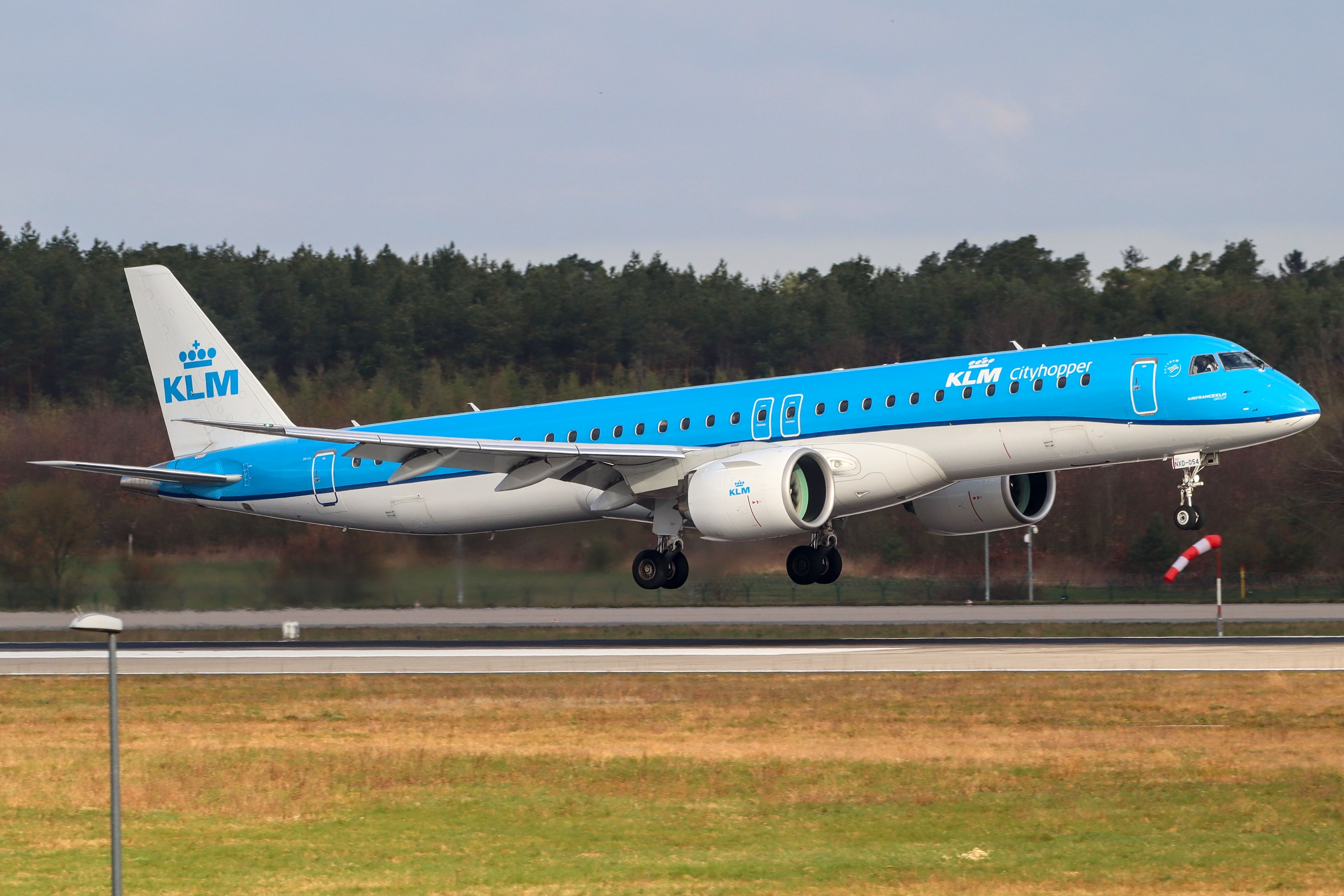 A KLM Cityhopper Embraer E195-E2 about to land.