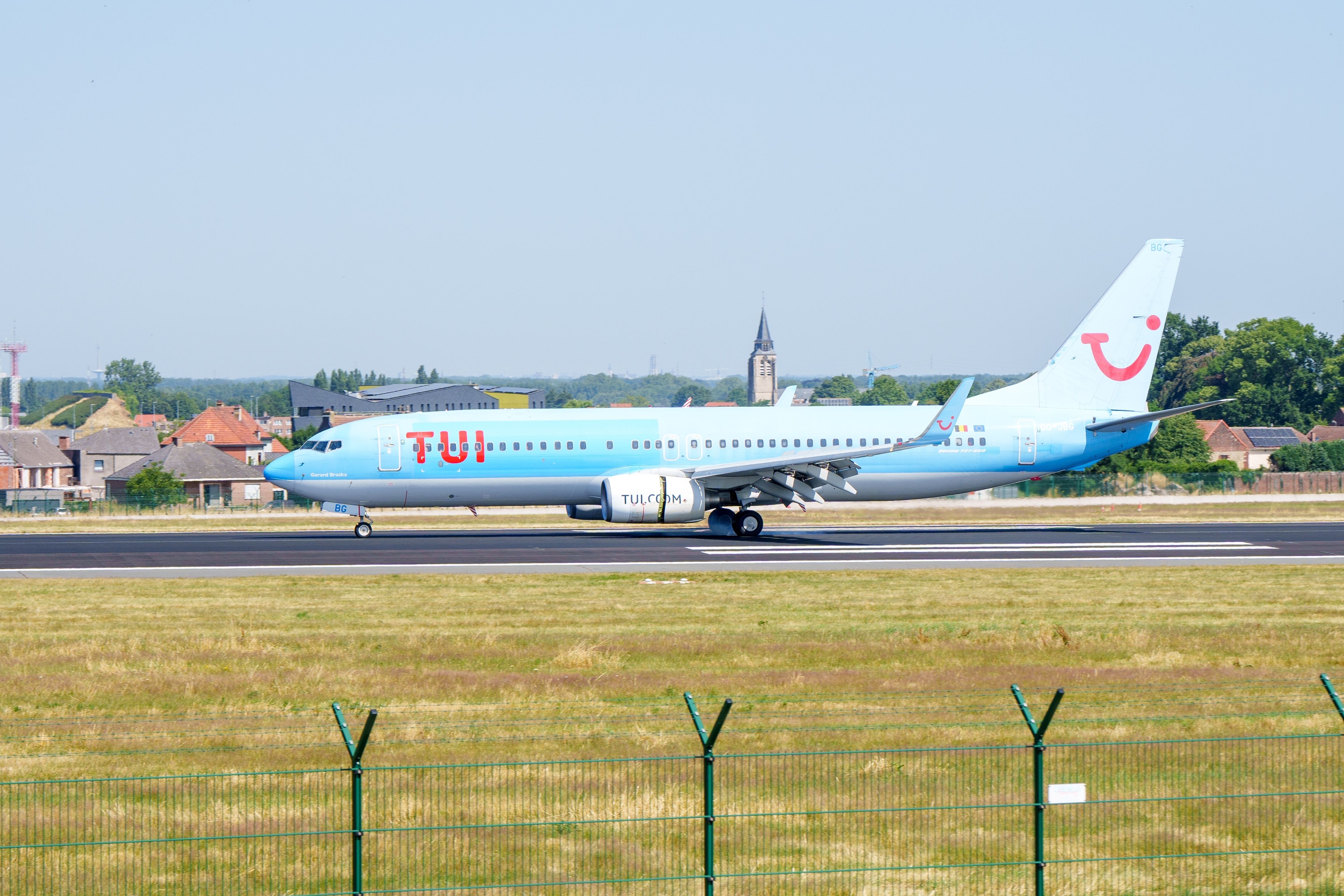 shutterstock_2347704775 - Brussels, Belgium - July,07,2023: TUI fleet 737 landing at Brussels Zaventum airport.