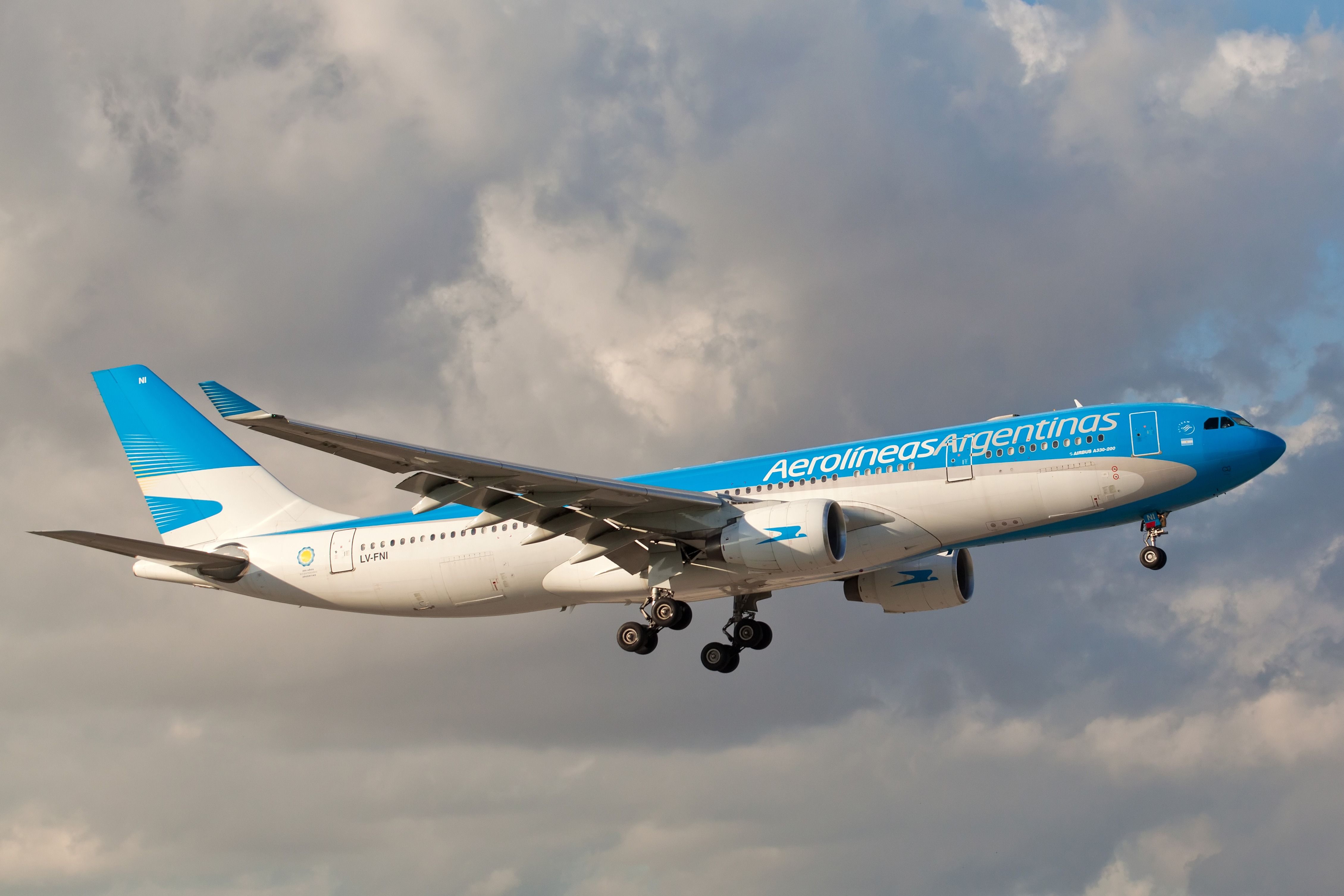 An Aerolíneas Argentinas Airbus A330 flying in the sky.