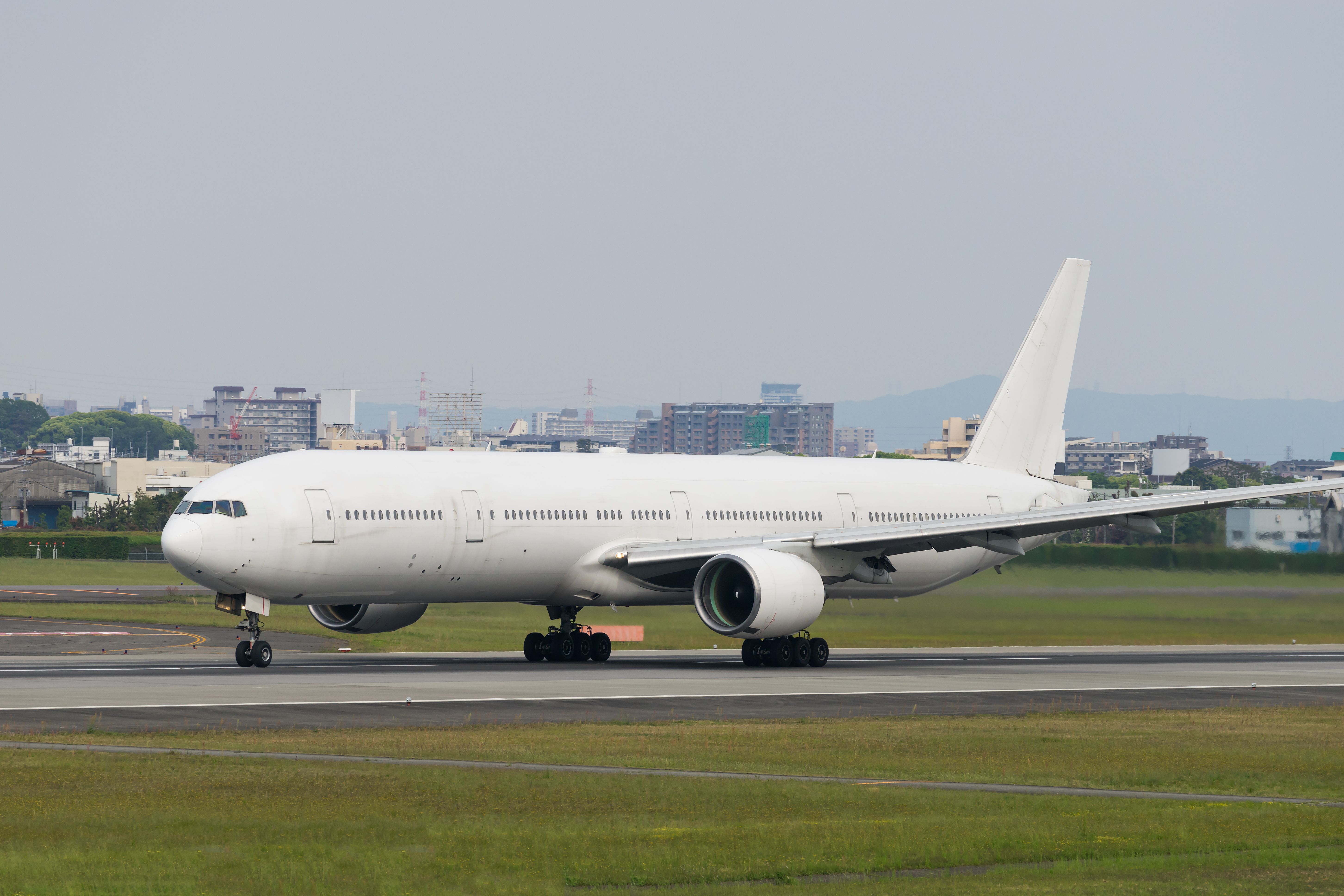 An Unliveried Boeing 777 Taxiing to the runway.