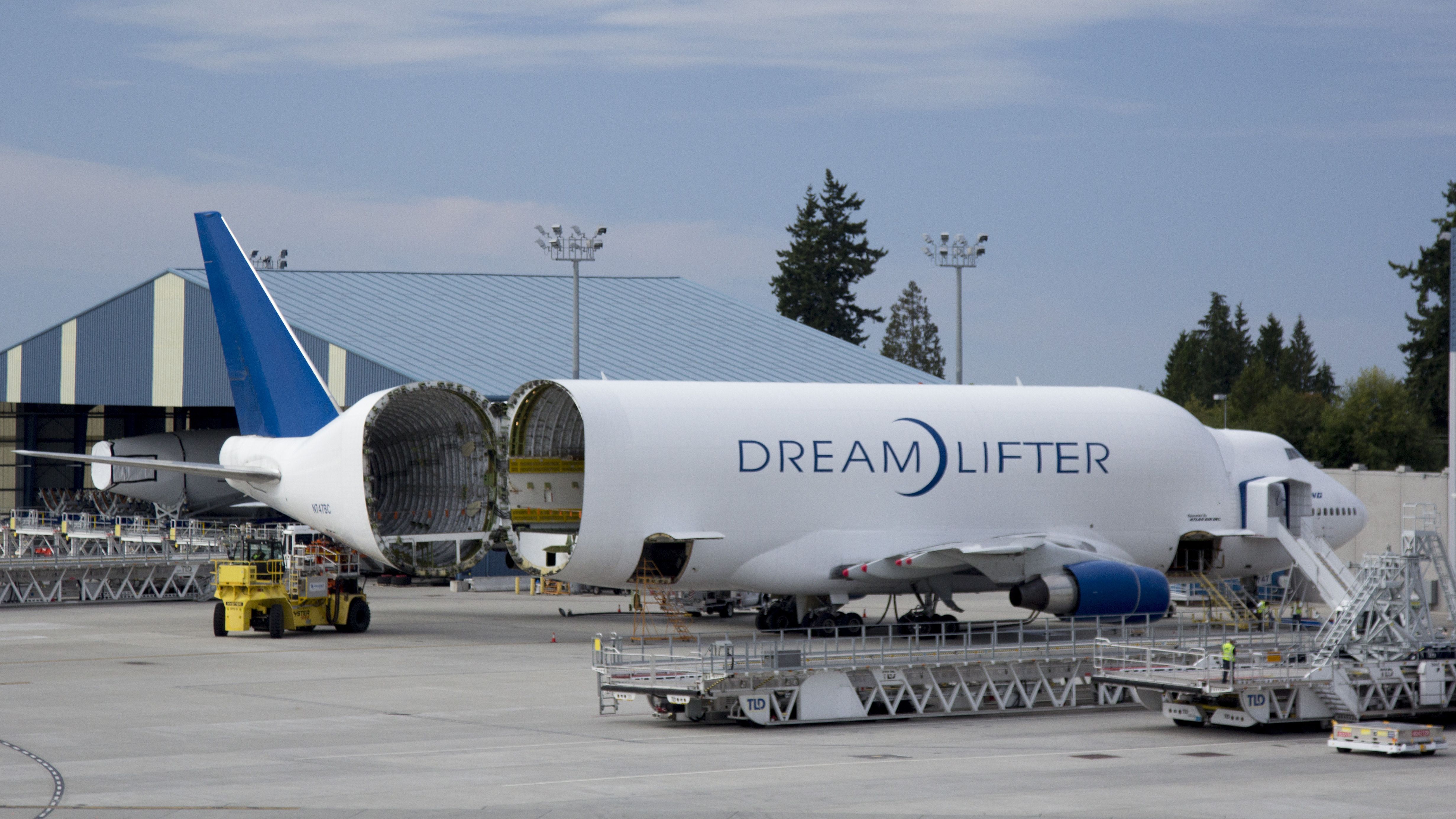 A Boeing Dreamlifter with its cargo door open.