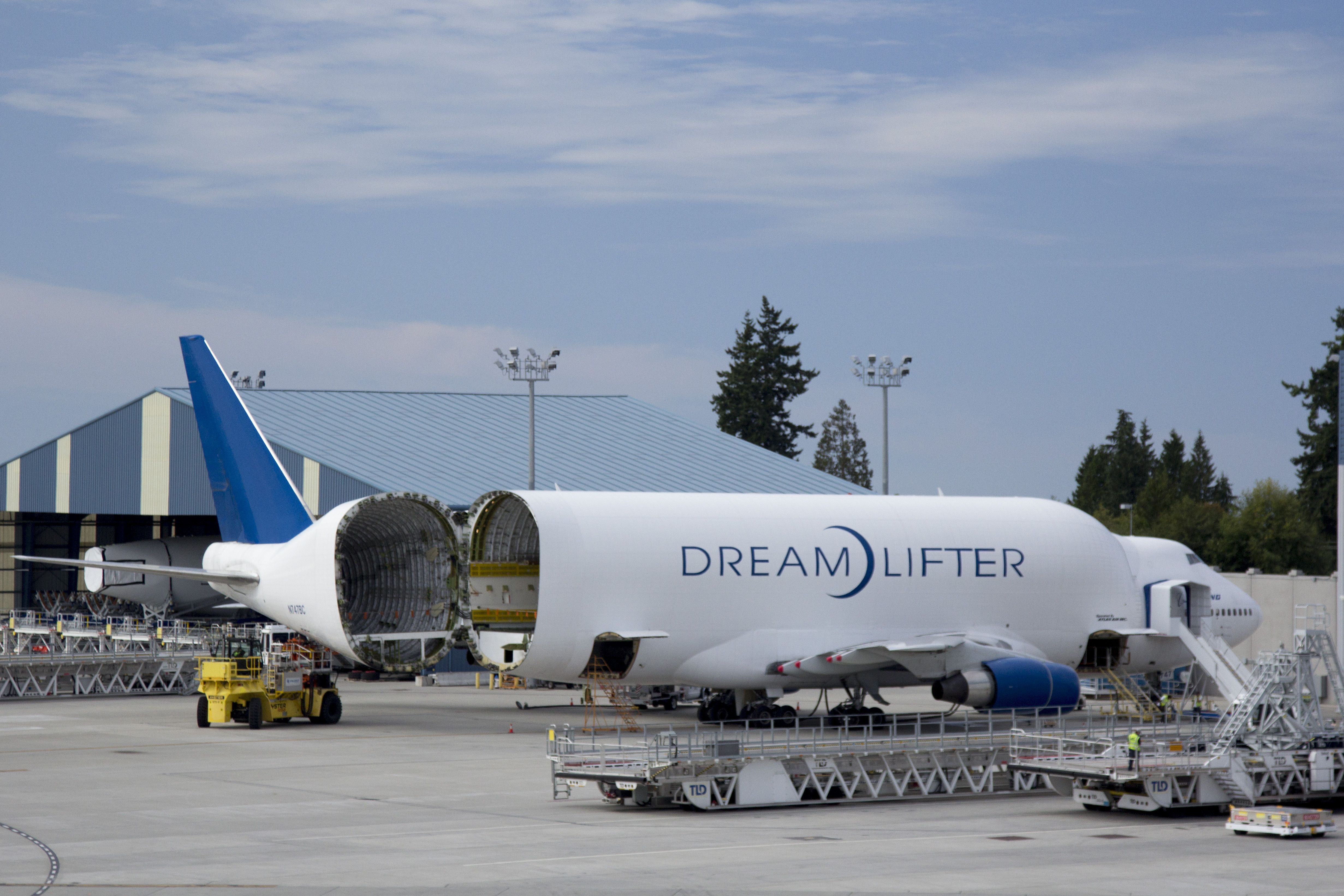 A Boeing Dreamlifter with its cargo door open.