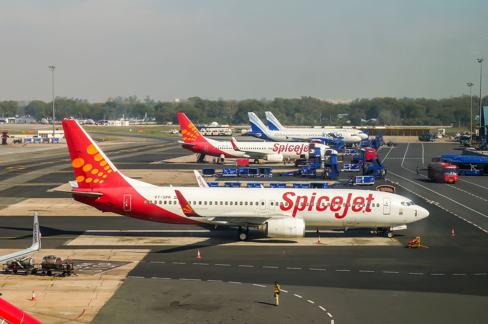 SpiceJet Boeing 737 at Delhi Indhira Gandhi International Airport DEL with IndiGo aircraft in the background