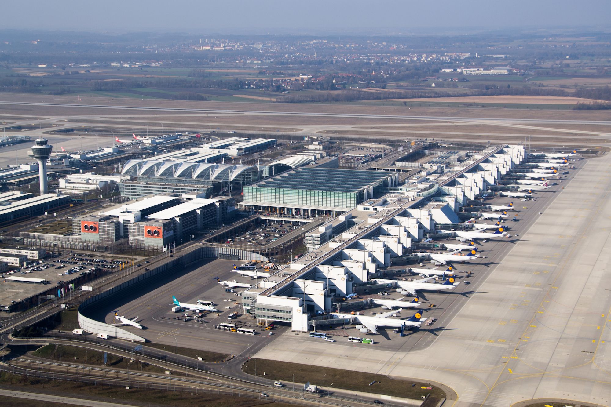 An aerial view of Munich Airport's terminals and gates.