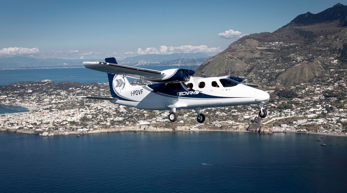 The Tecnam P2012 Traveller flying around the island