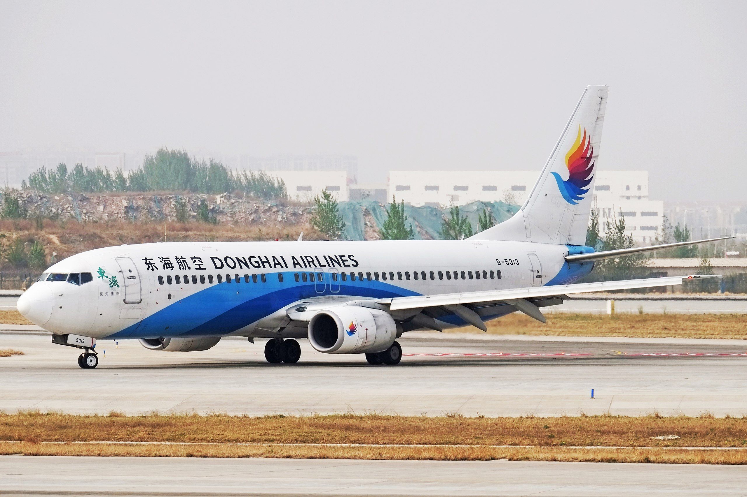 A Donghai Airlines Aircraft On An Airport Apron.