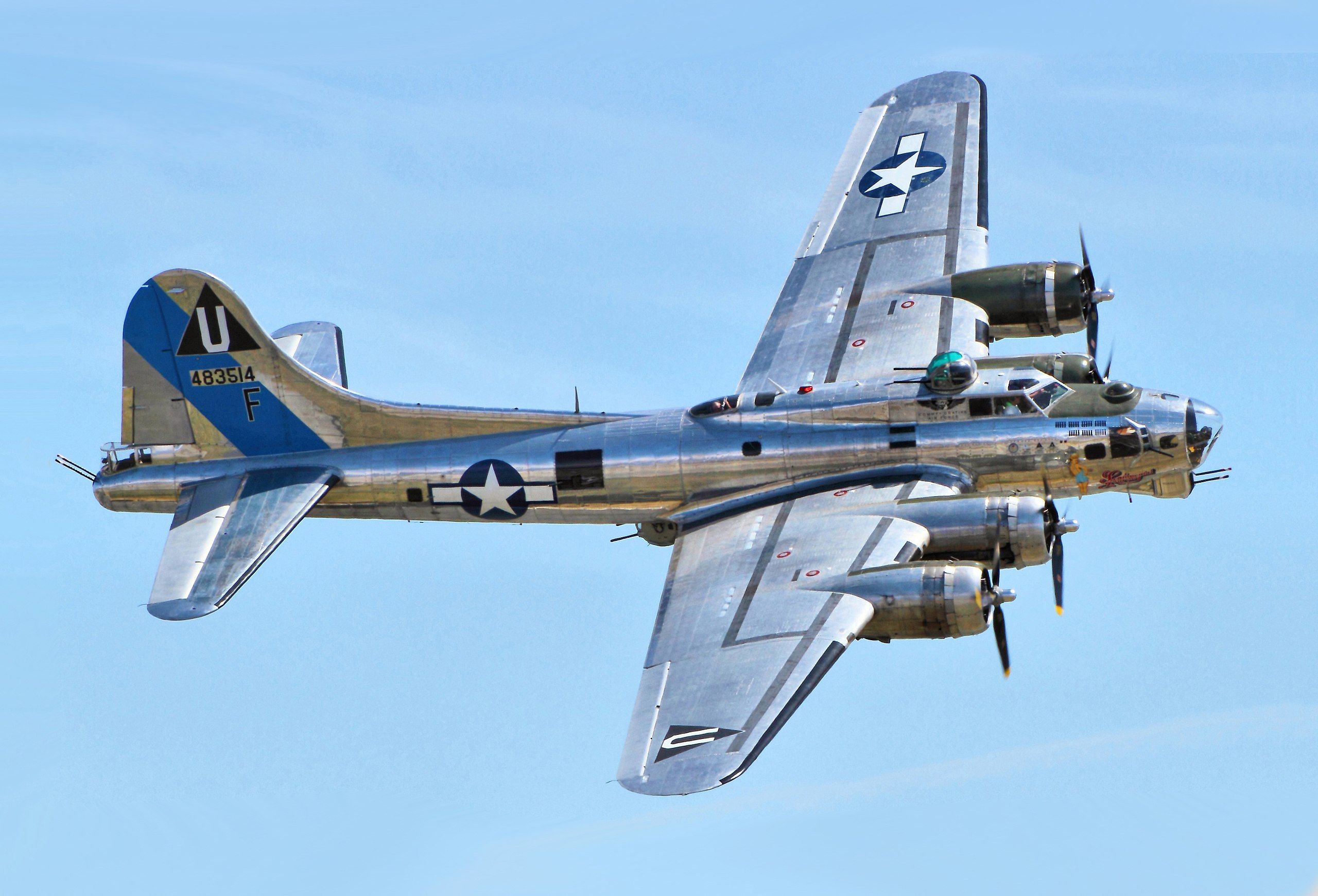 The B-17 named Sentimental Journey flying in the sky.