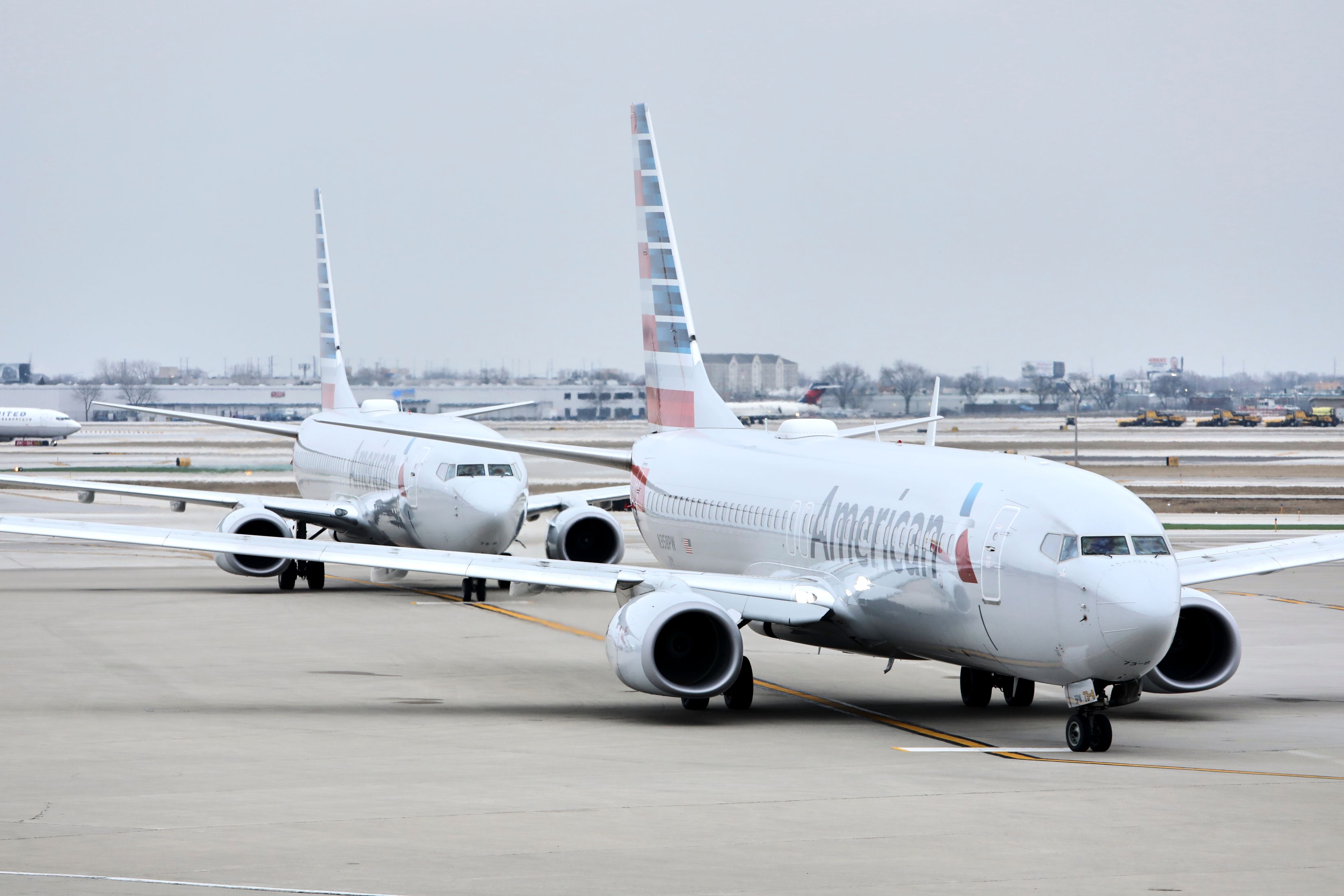 American Airlines planes preparing to take off