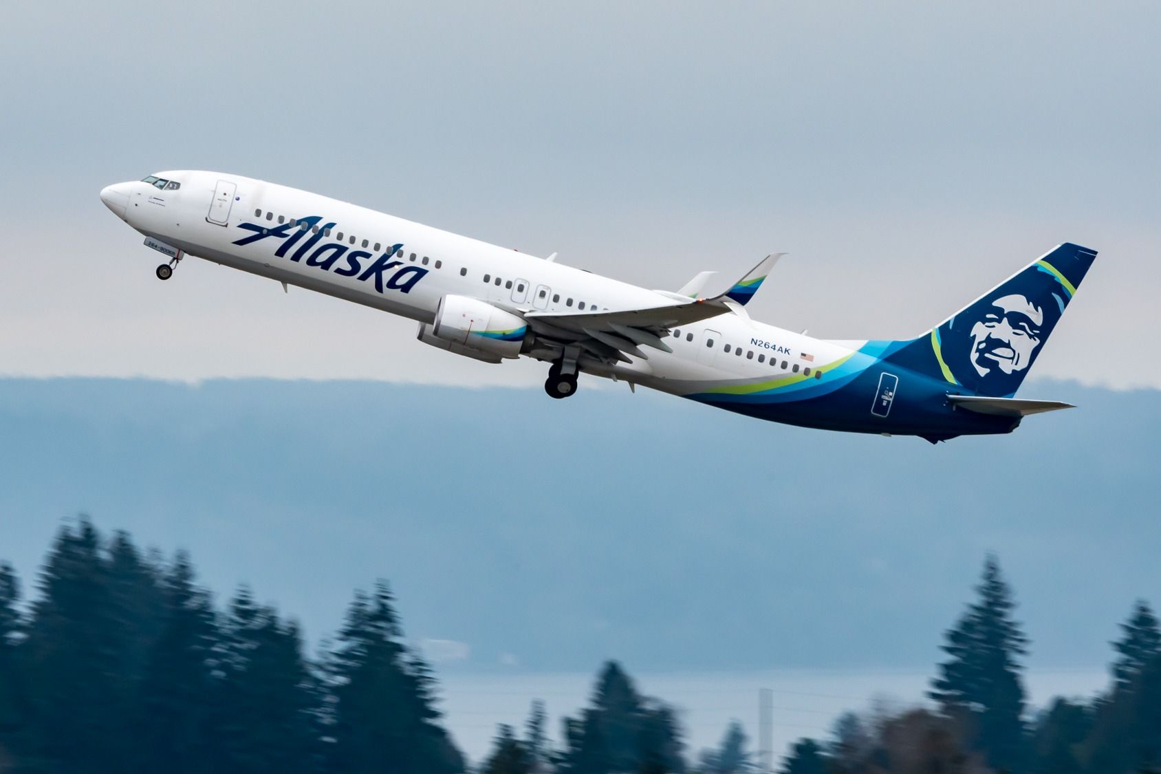 An Alaska Airlines Boeing 737-900ER Taking off.