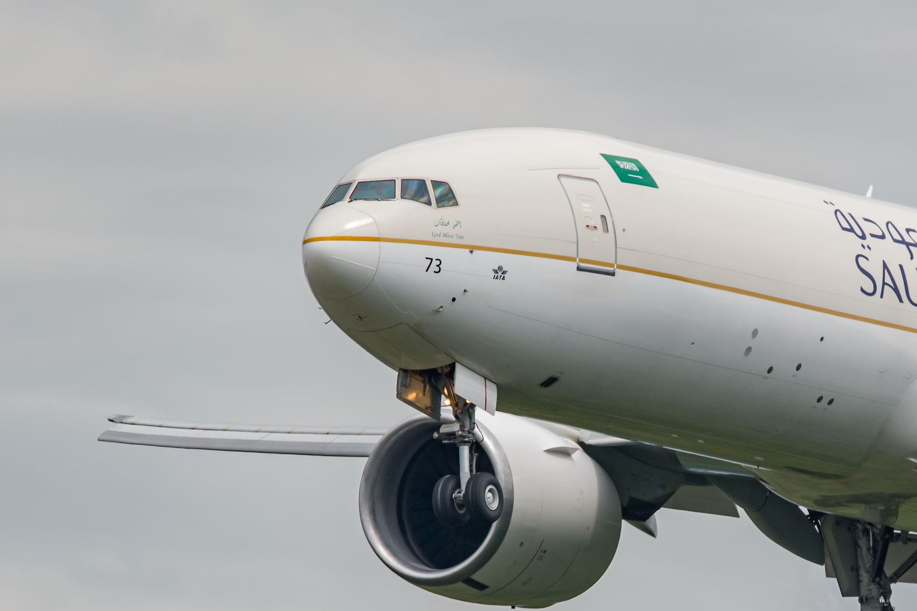 A Saudia Cargo Boeing 777F Flying in the sky.